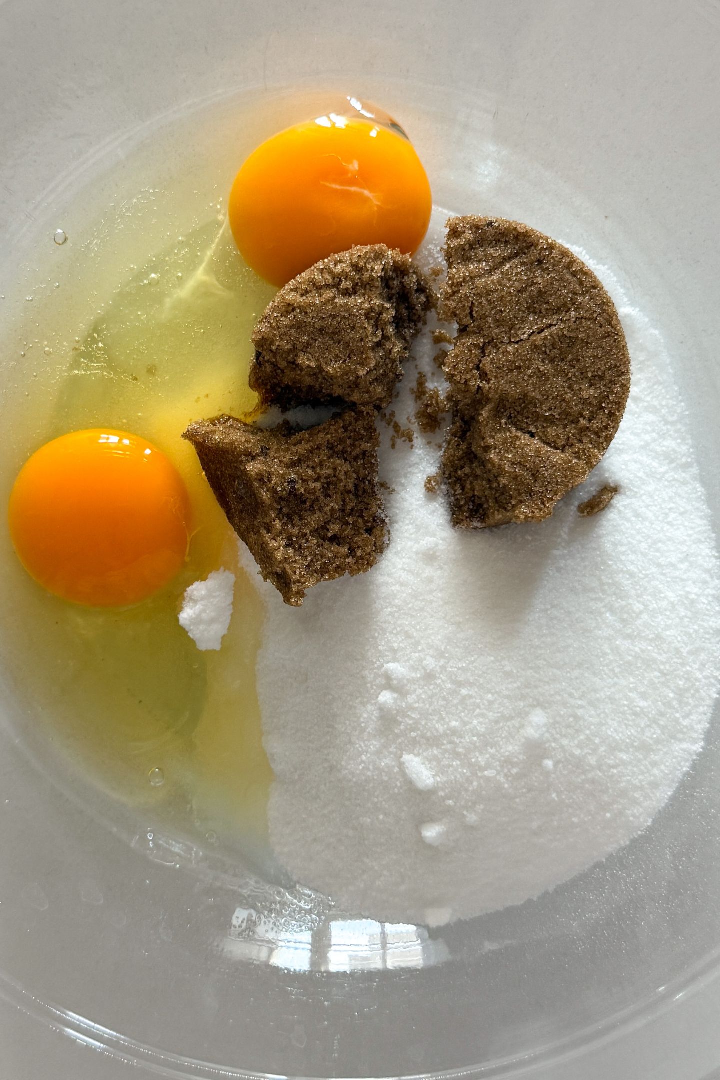 Sugars and eggs in a bowl.