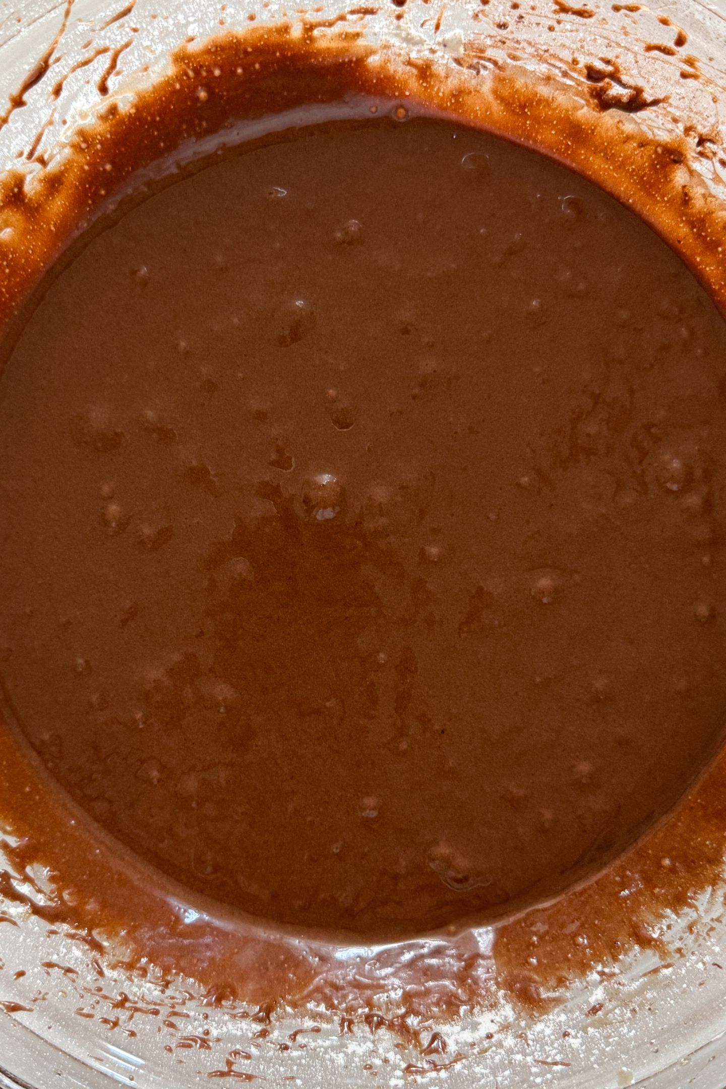 Dry and wet ingredients combined in a bowl.