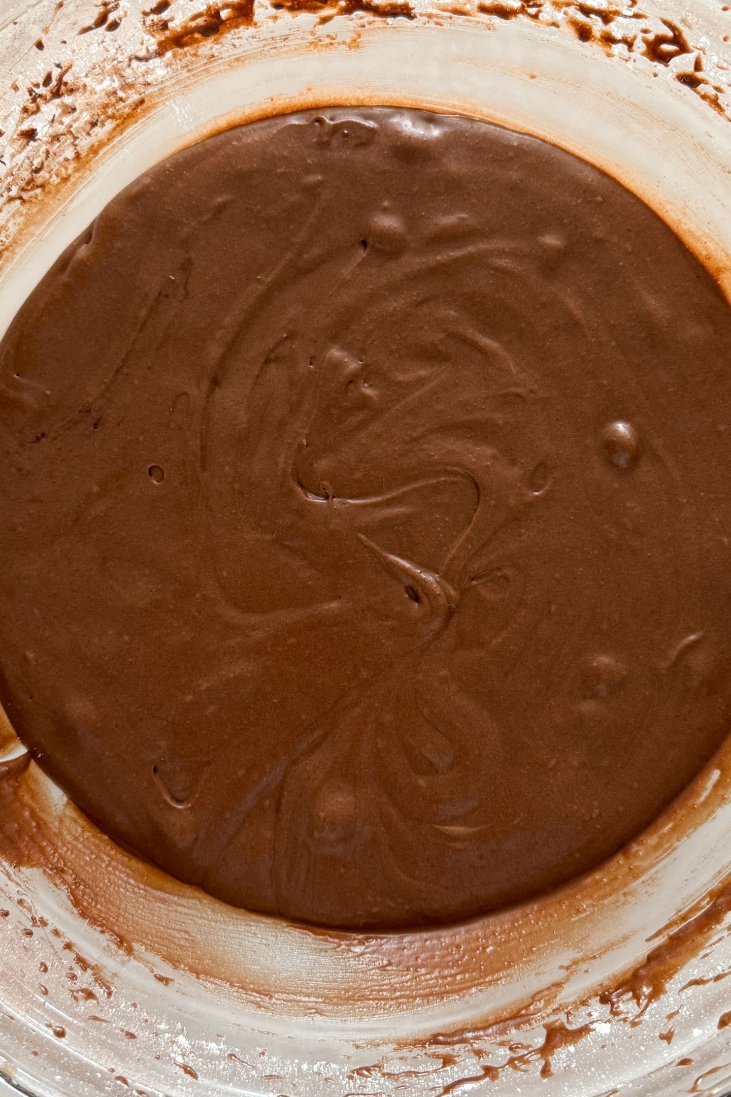 Mixed brownie cookie batter in a bowl after being chilled.