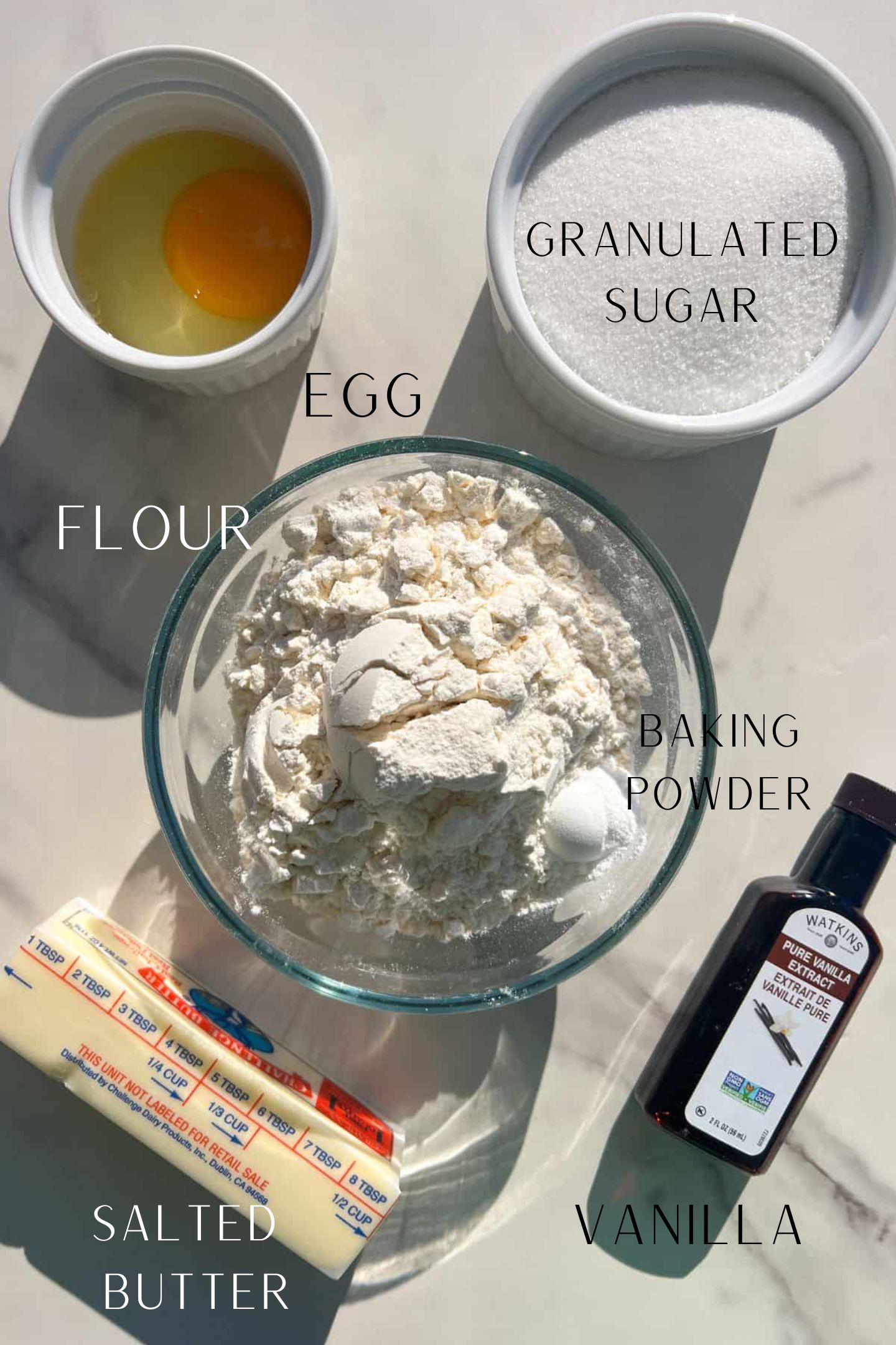 Ingredients measured out to make the base of the sugar cookie base.