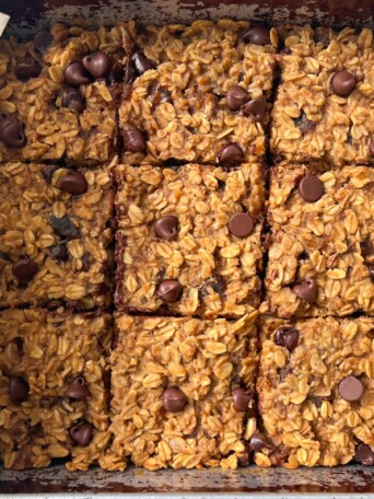 Sliced Chocolate Baked Oatmeal Bars in a pan.