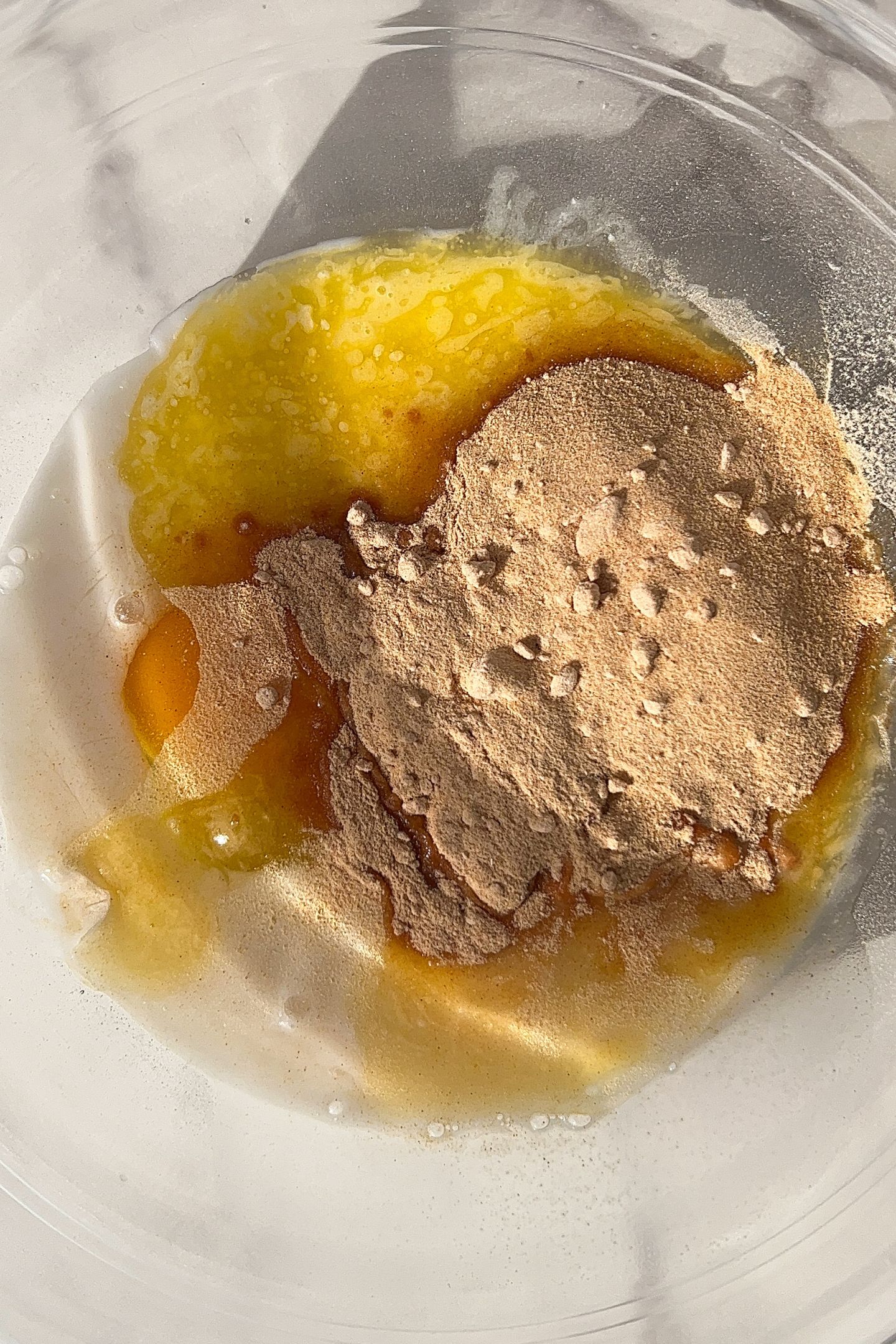 Wet ingredients in a large mixing bowl