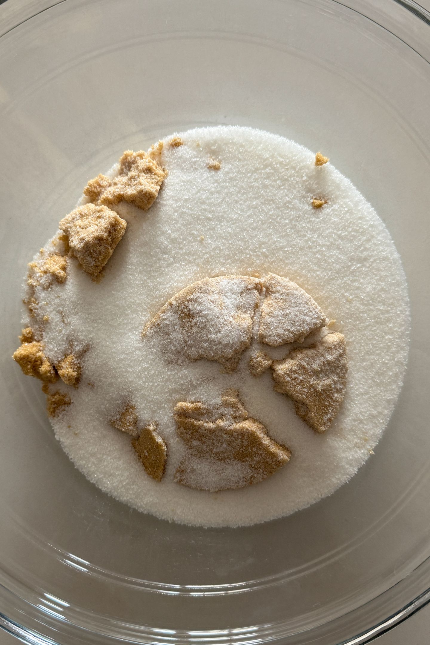 Granulated and brown sugar in a mixing bowl.