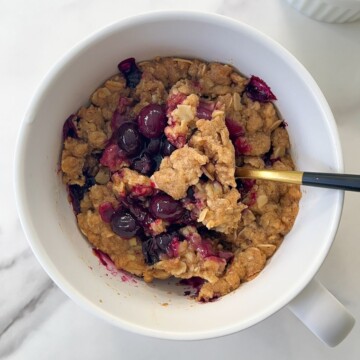 Eating the Blueberry Crisp with a spoon.