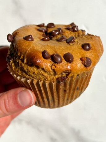 Holding a protein muffin in my hand.