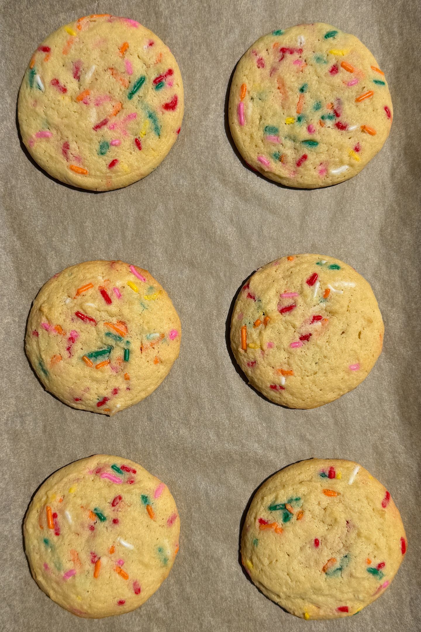 Baked cookies on parchment paper.