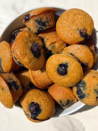 Mini blueberry muffins in a bowl