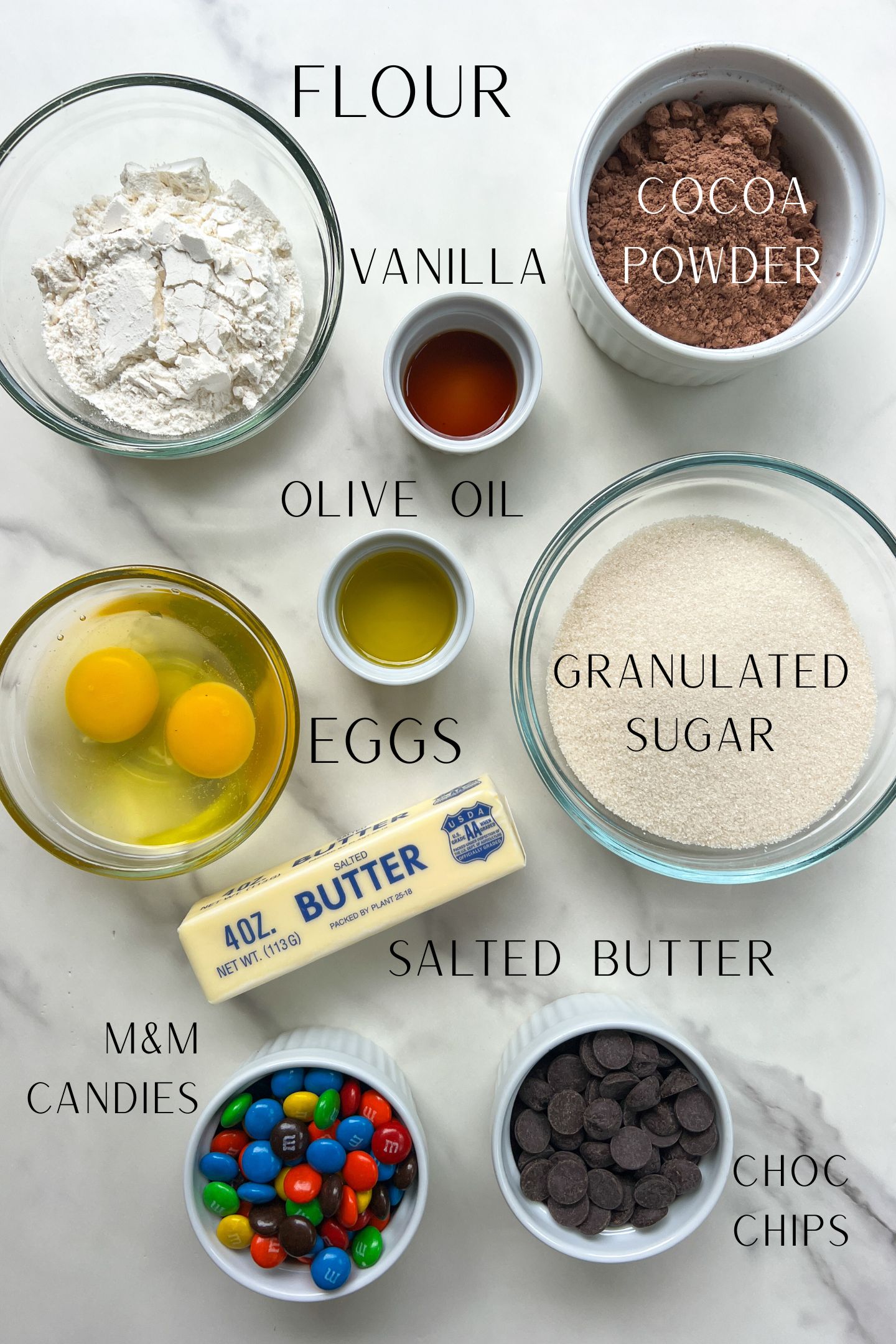 Ingredients measured out in bowls to make M&M Brownies.