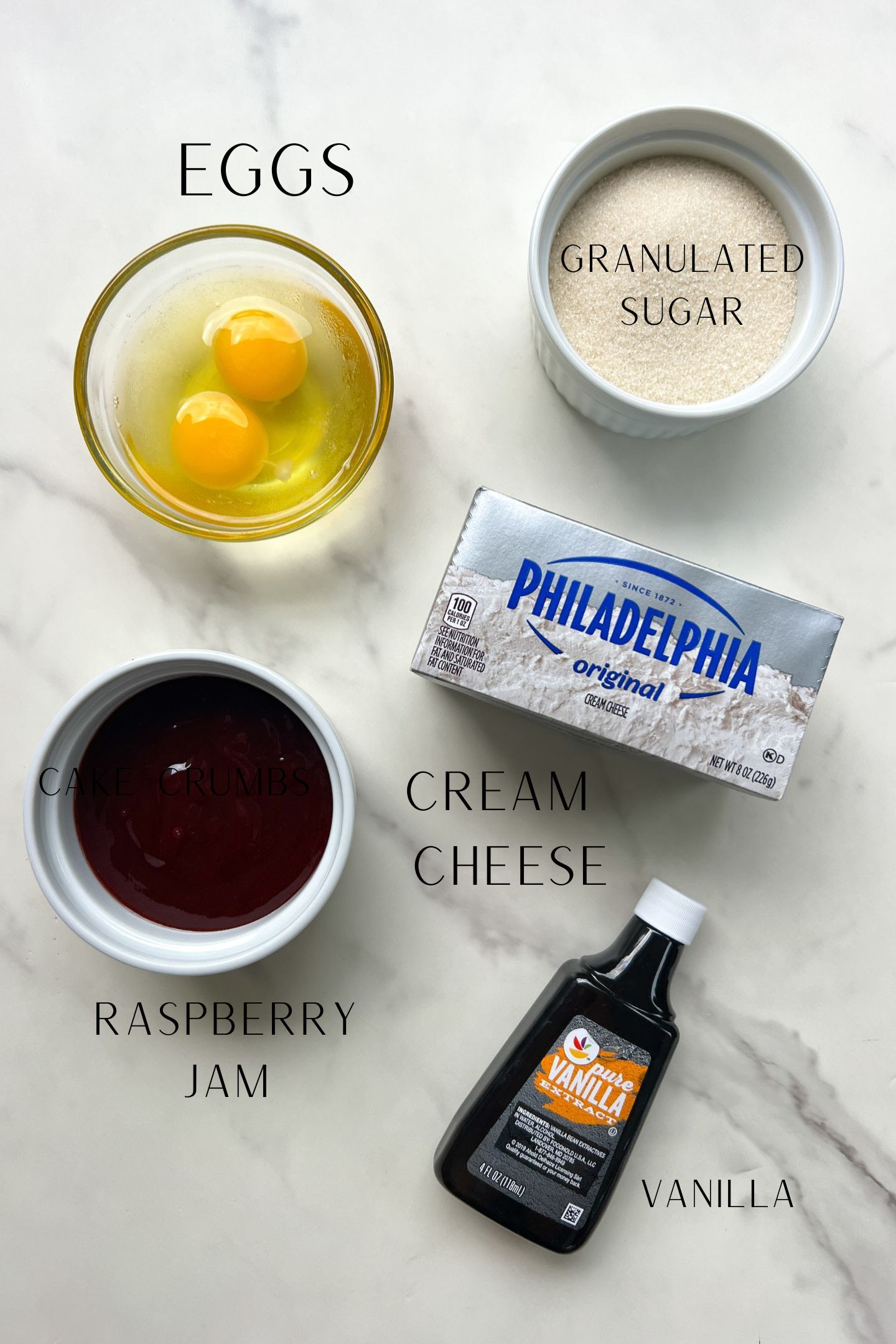 Ingredients measured out in bowls to make Raspberry Cheesecake Bars.