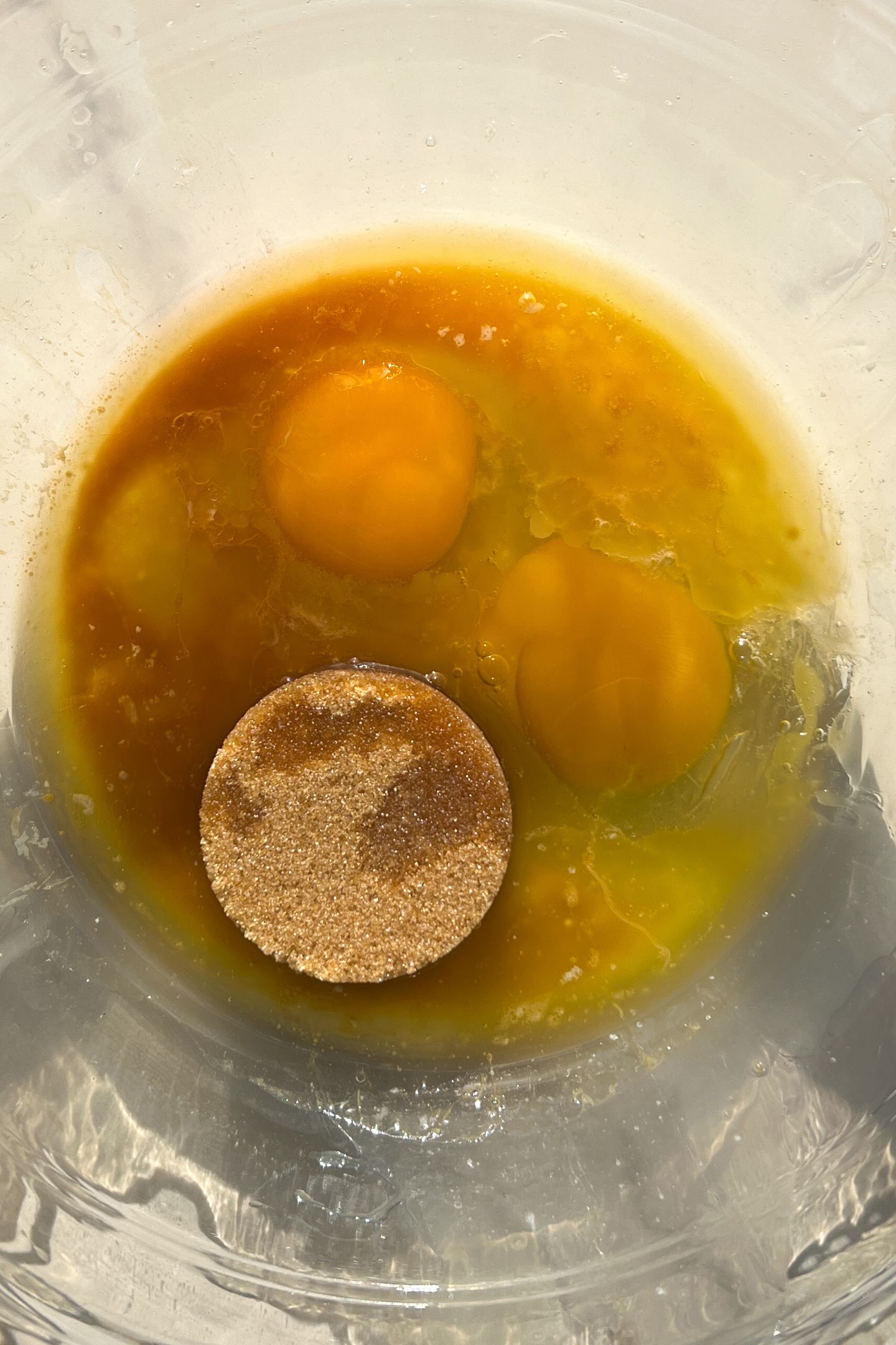 Wet ingredients in a mixing bowl to make the muffin batter.