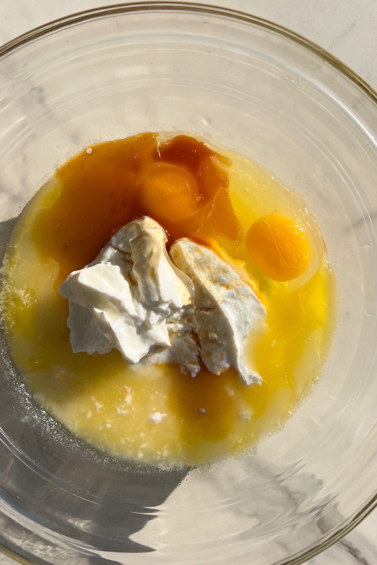 Wet ingredients in a large mixing bowl.
