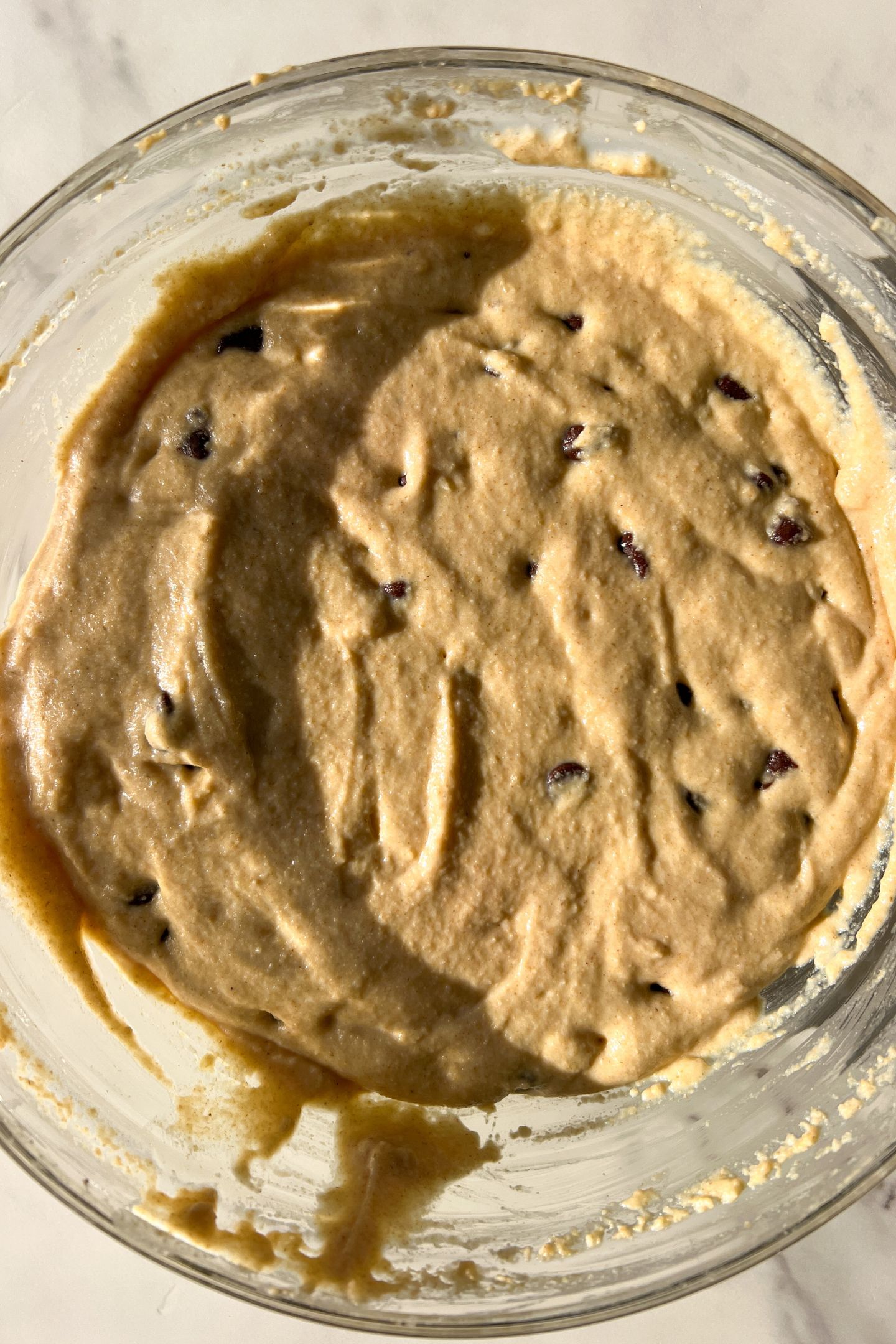 Chocolate chip muffin batter in a bowl.