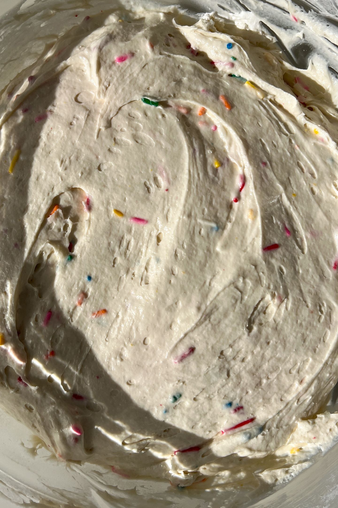 Funfetti Cake Dip blended in a bowl.