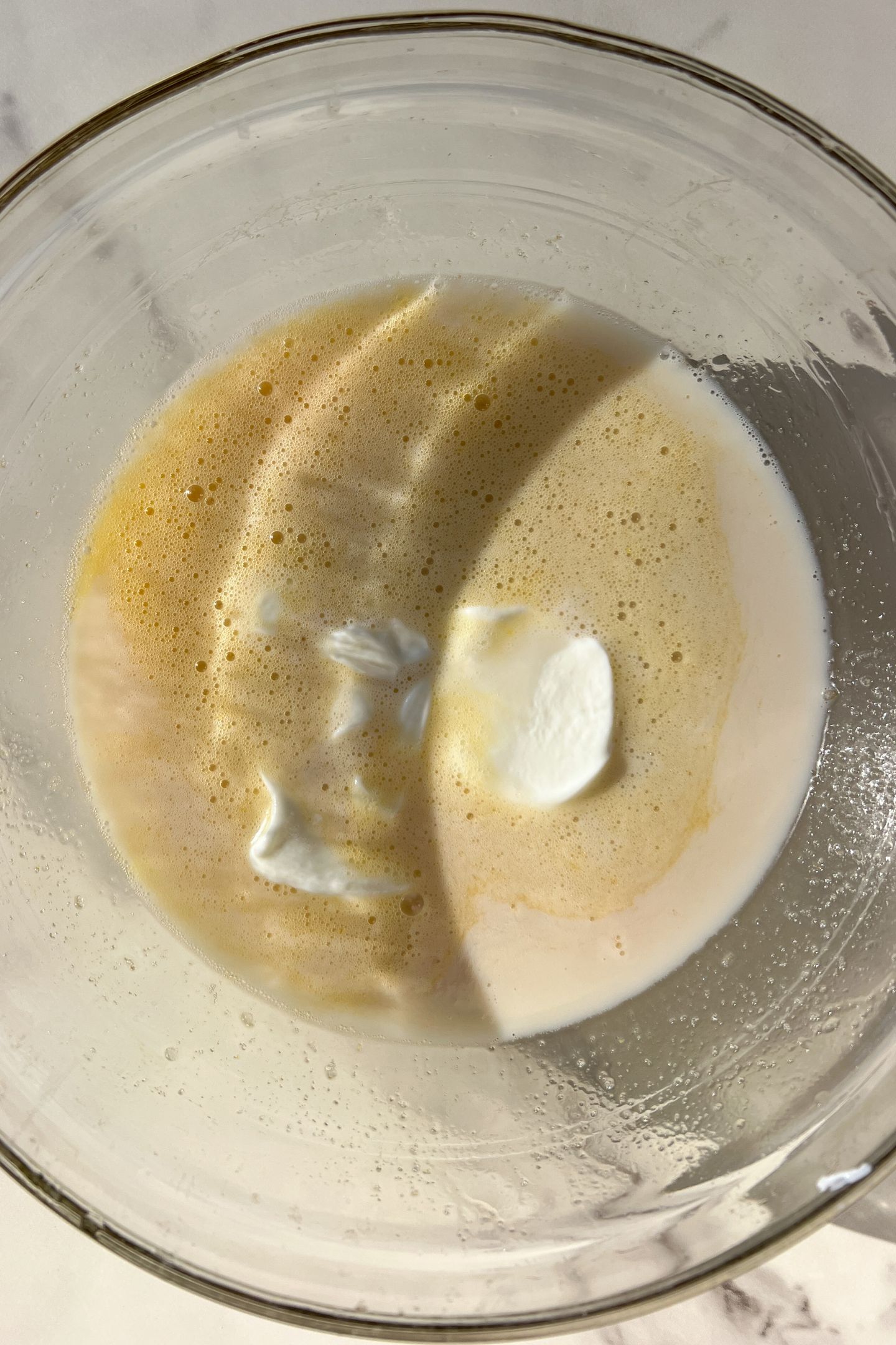 Wet ingredients in a mixing bowl.