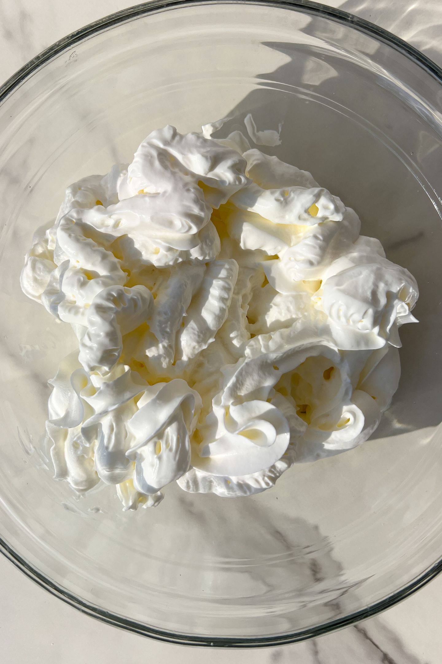 Whipped cream in a bowl.