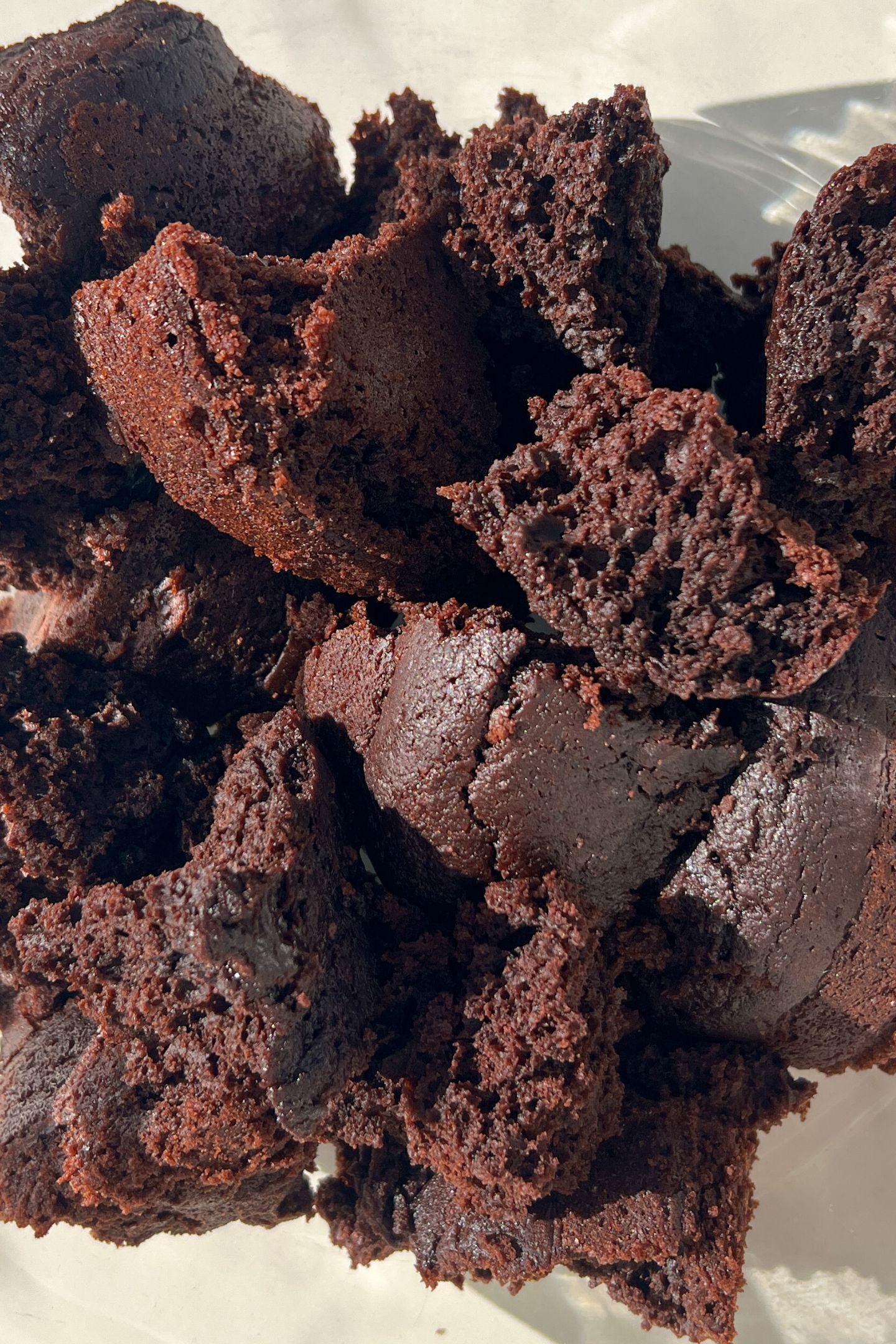 Crumbled up cake in a bowl.