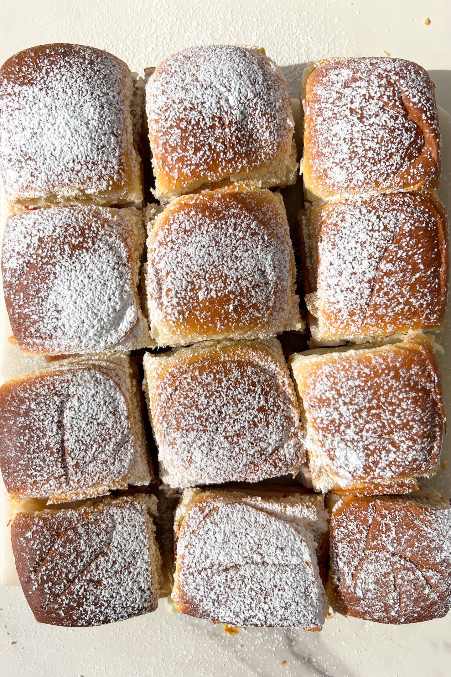 Monte Cristo Sliders dusted in powder sugar.