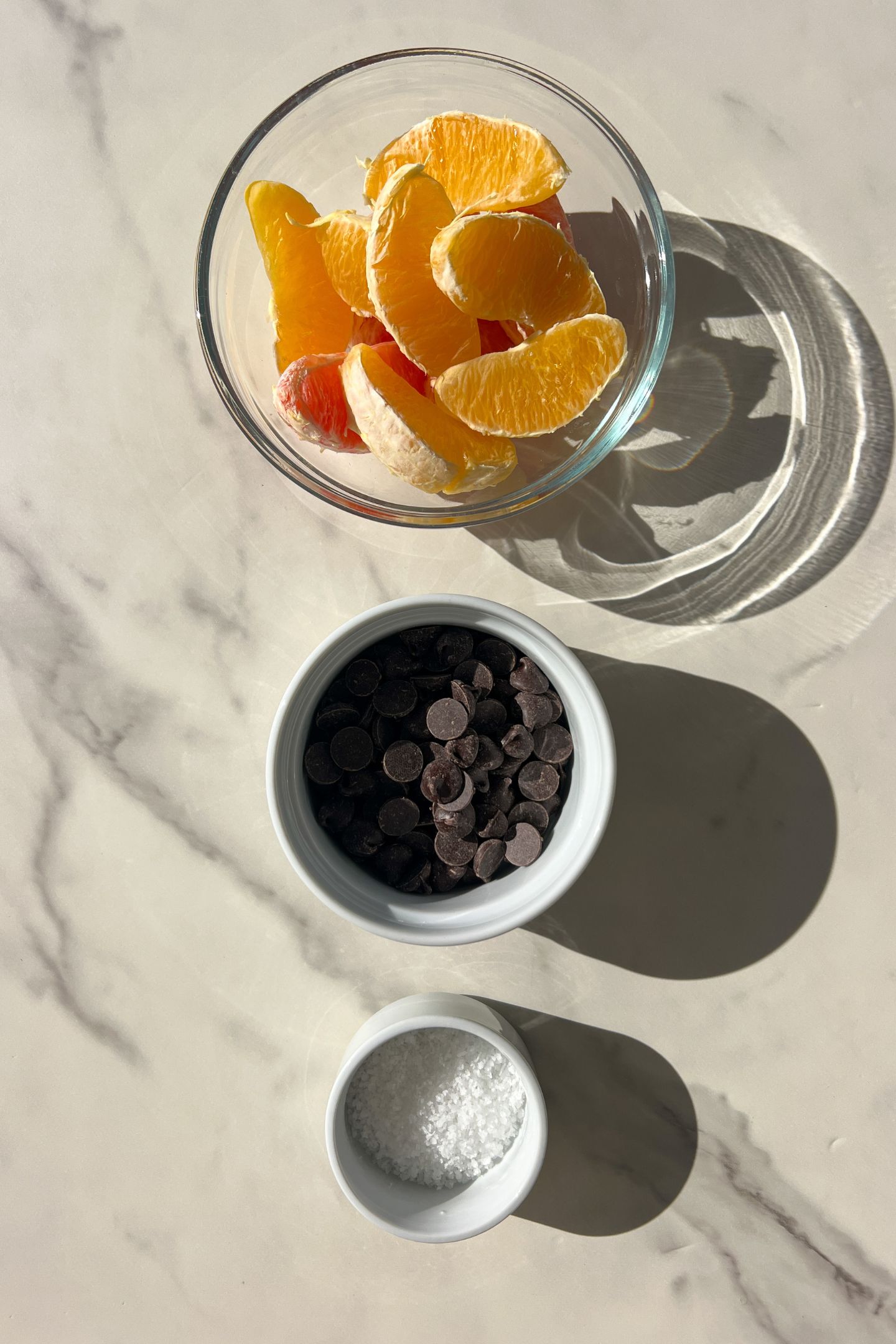 Ingredients measured out in bowls to make chocolate oranges.