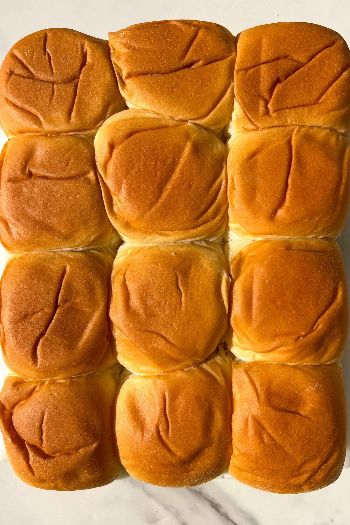 Top layer of rolls placed back on the sliders.