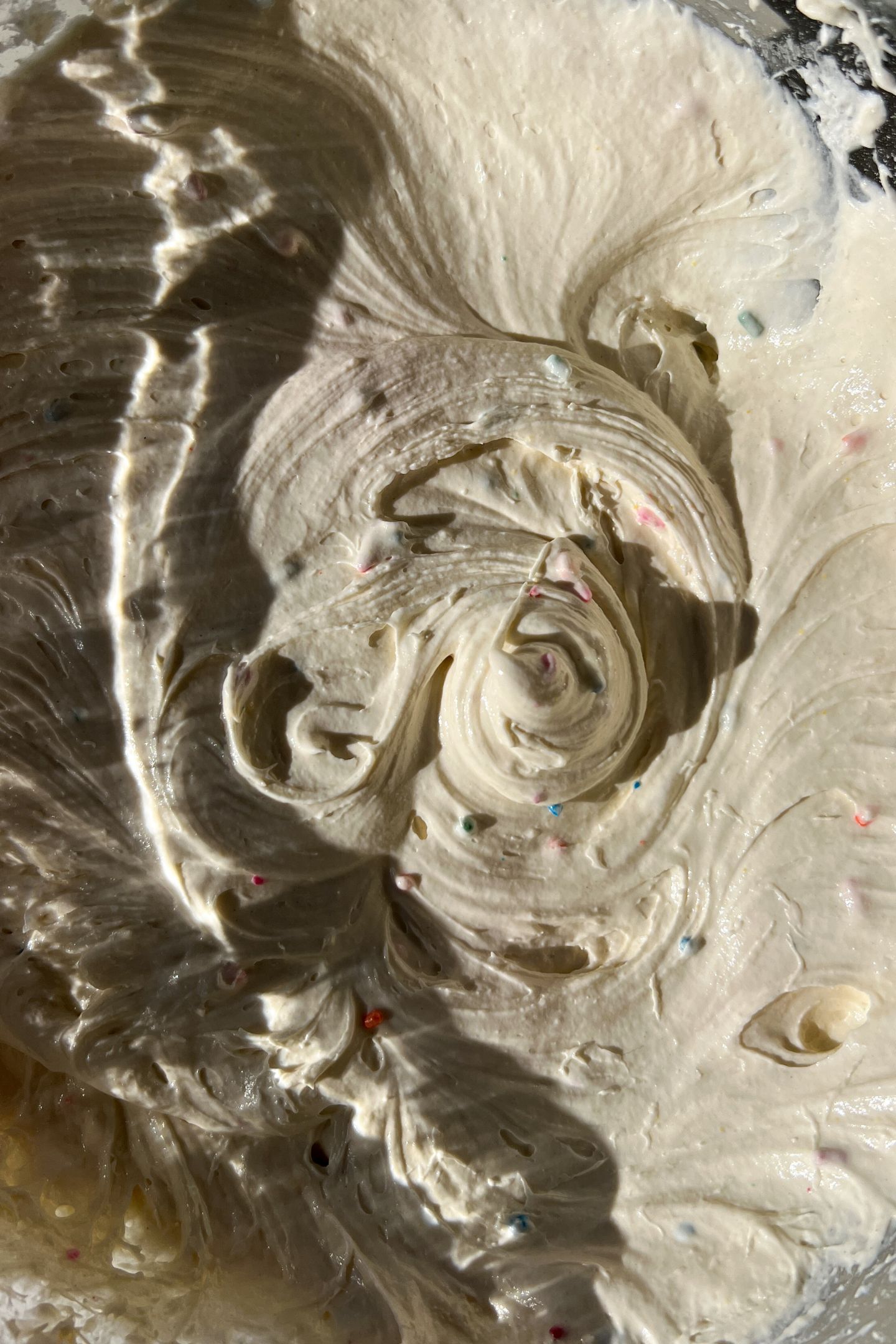 Funfetti Cake Dip blended in a bowl.