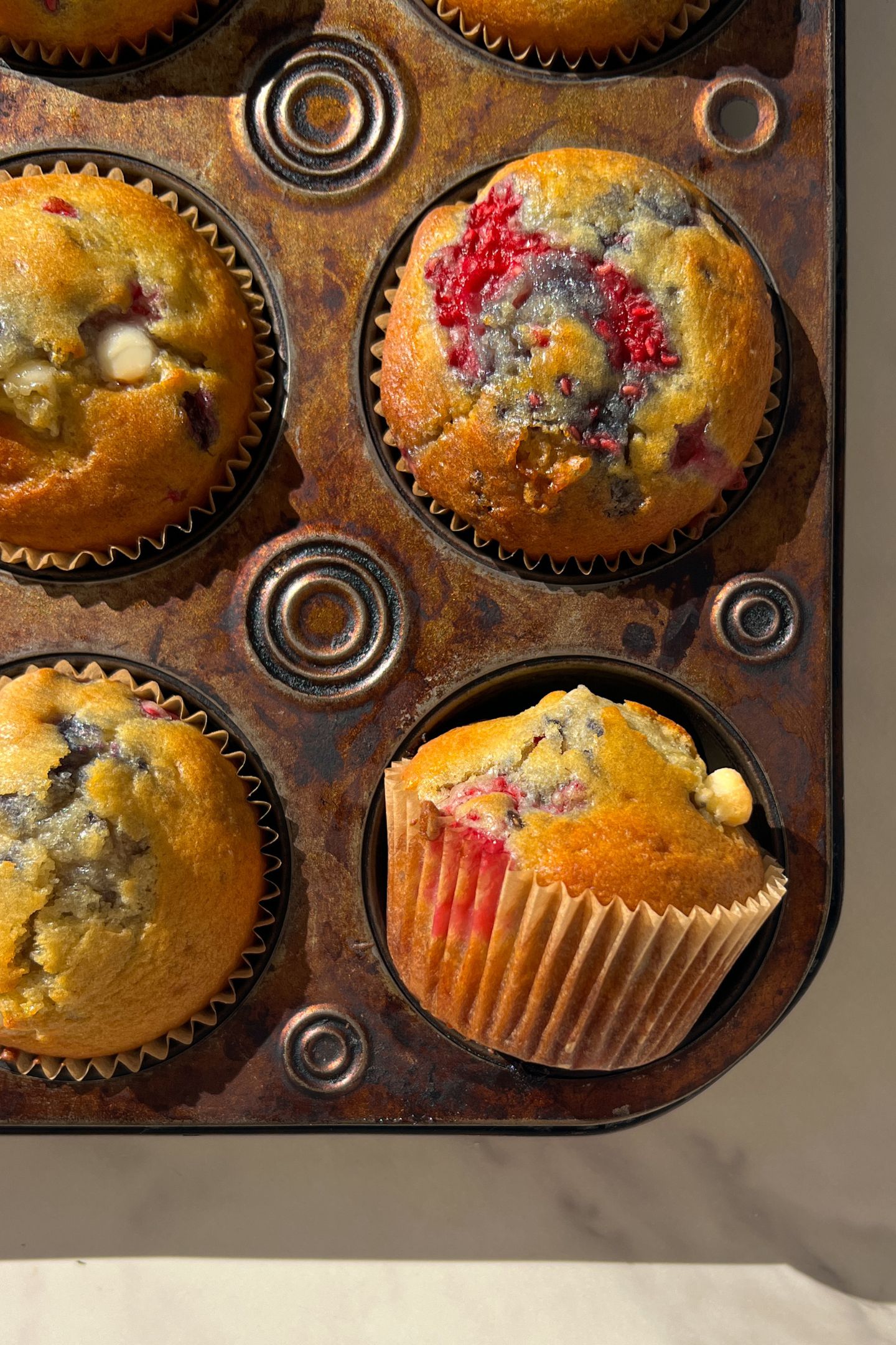 Muffins in a muffin tin.