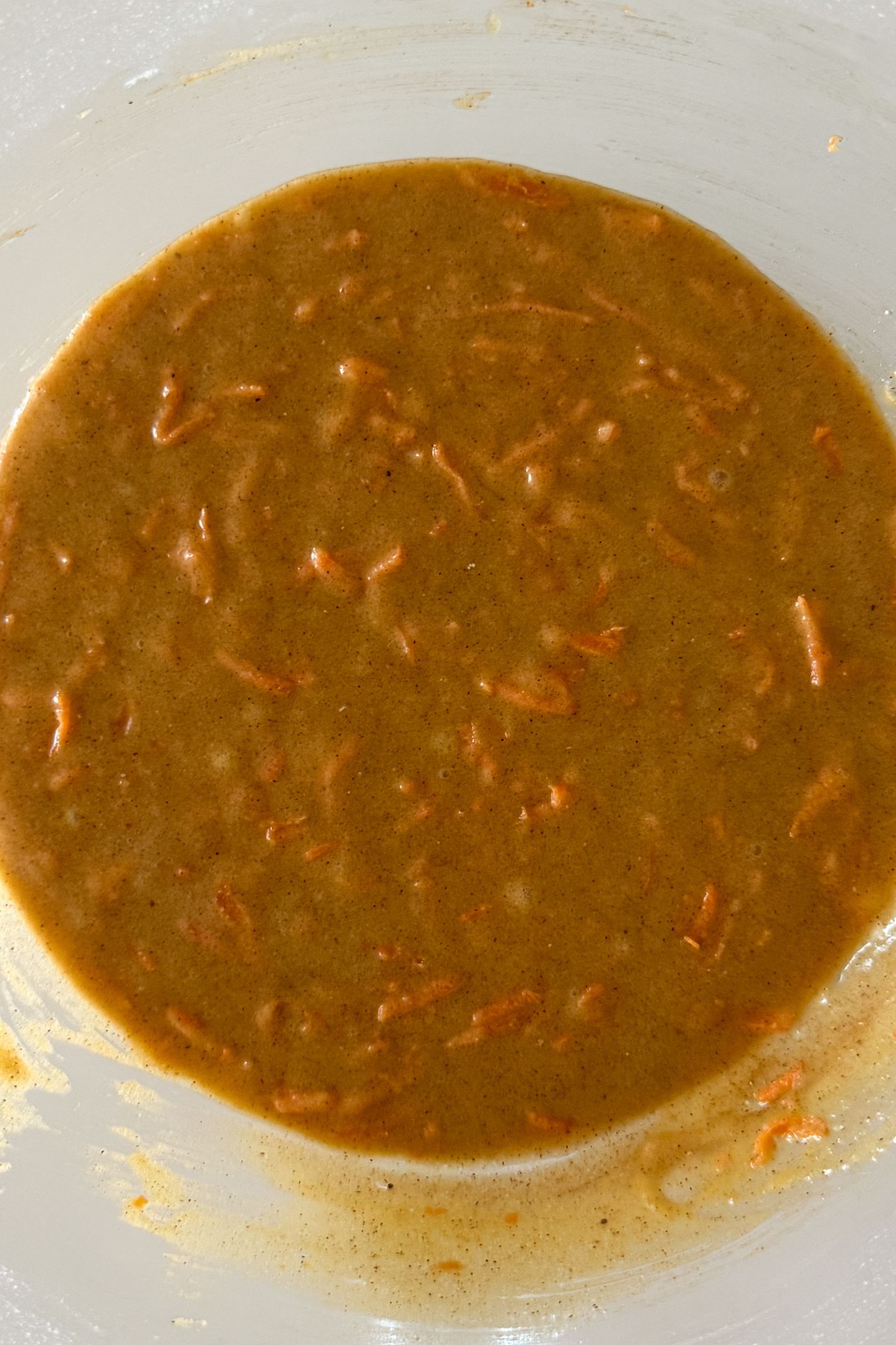 Carrot cupcake batter in a bowl.