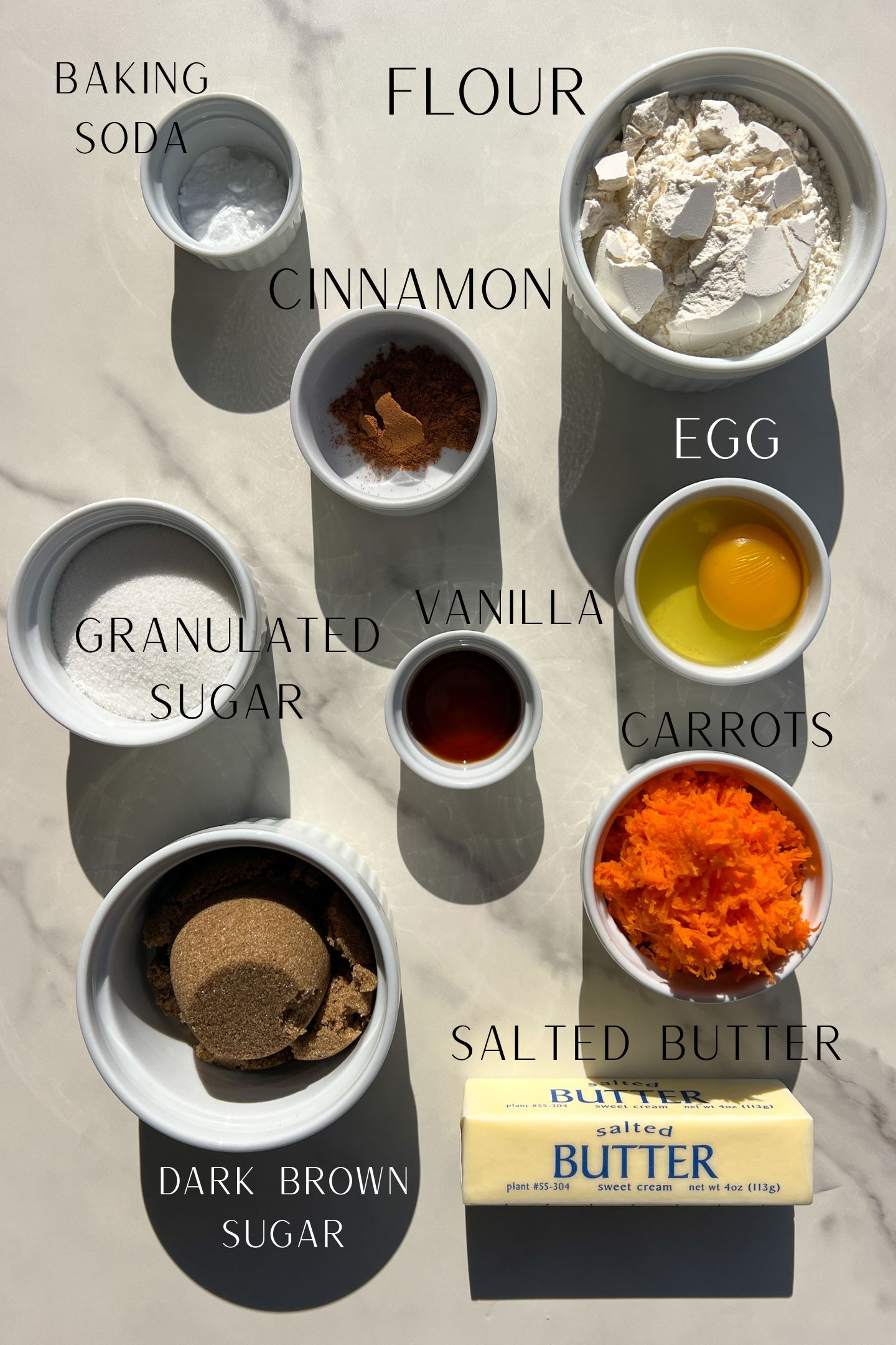 Carrot Cake Cookie Ingredients measured out in bowls.