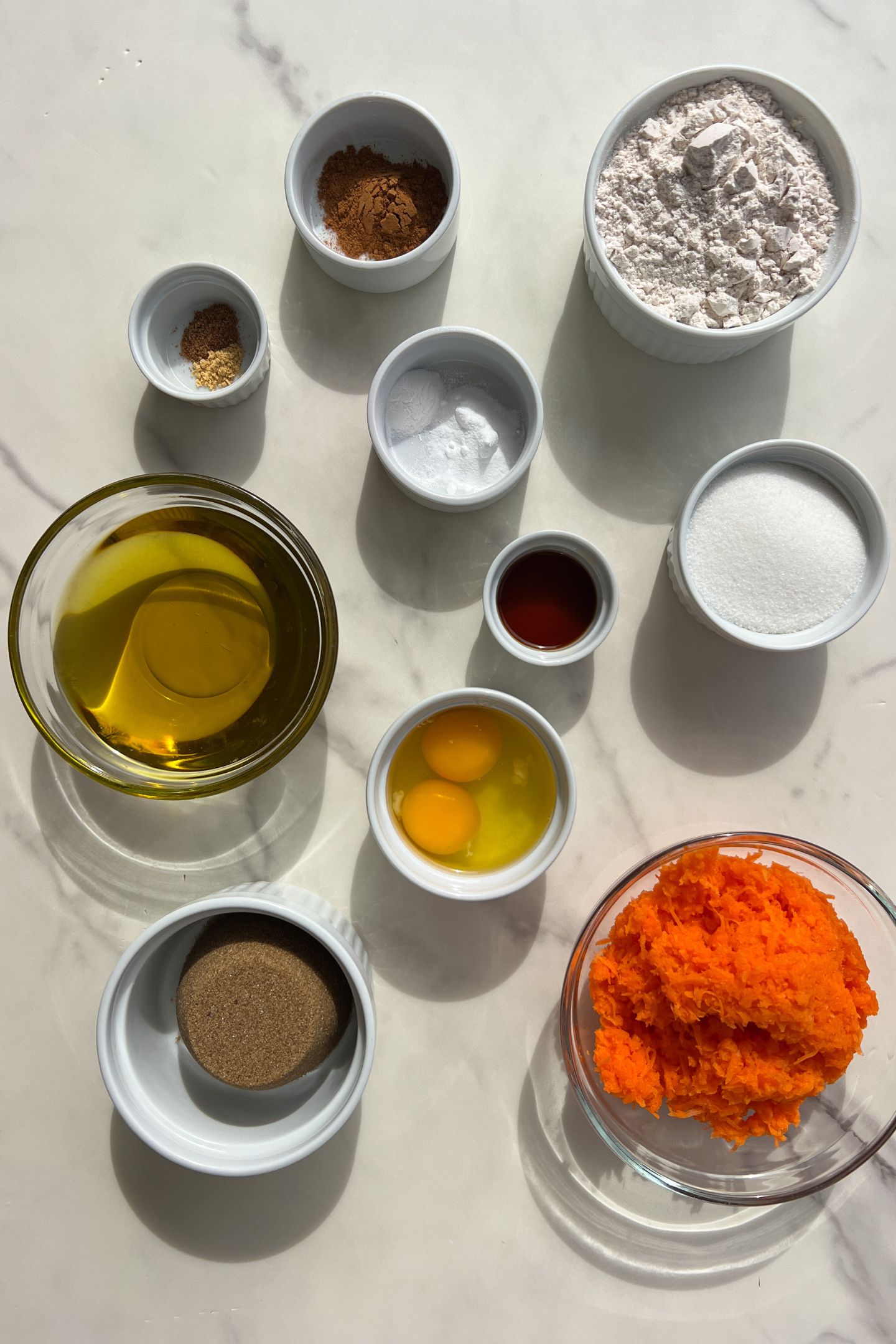 Ingredients measured out to make carrot cake cupcakes.