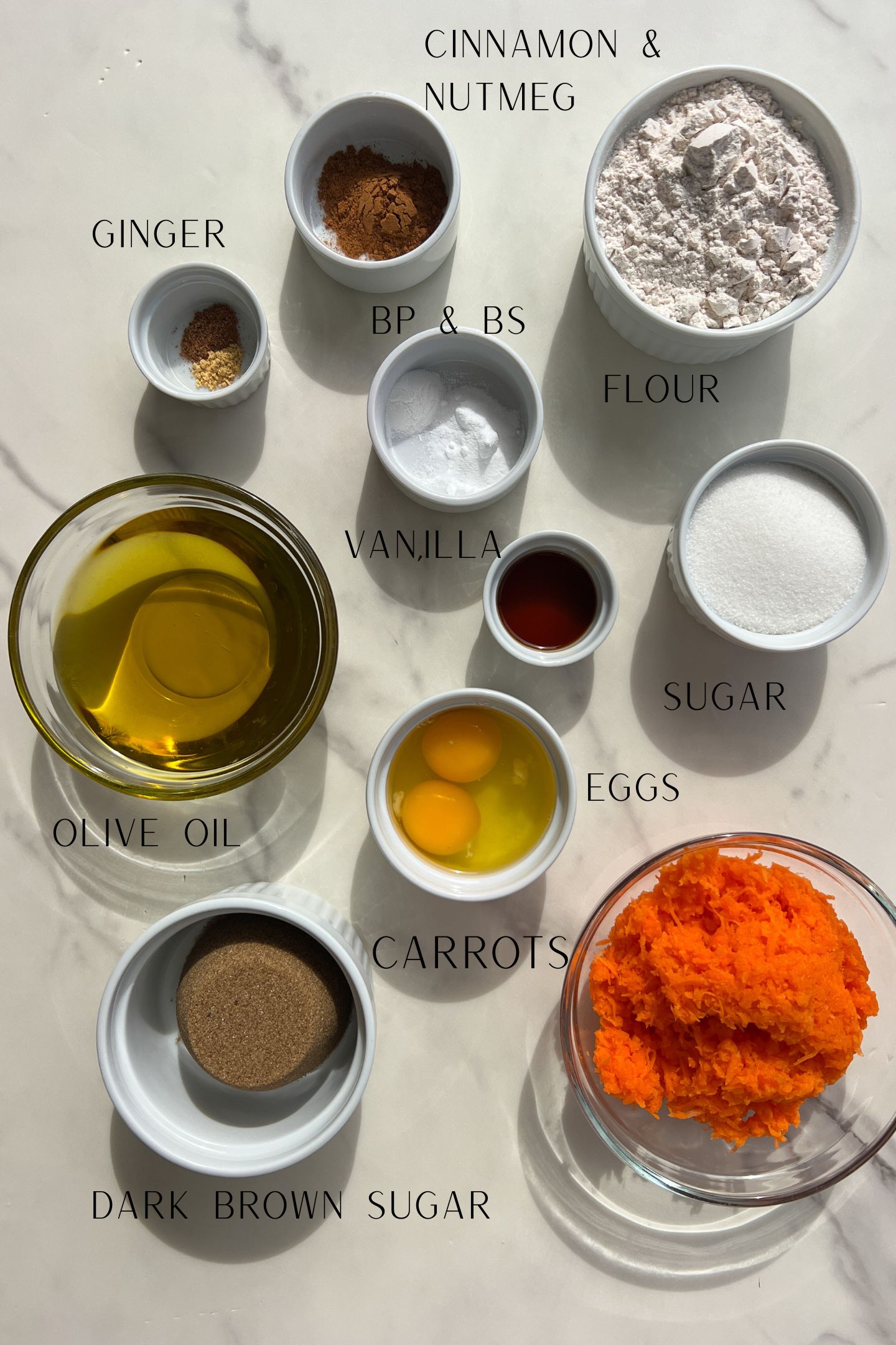 Ingredients measured out to make carrot cake cupcakes.
