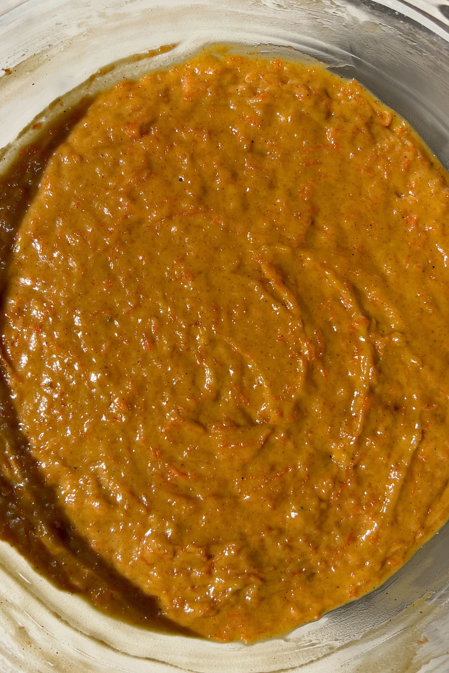 Carrot cake batter in a mixing bowl.