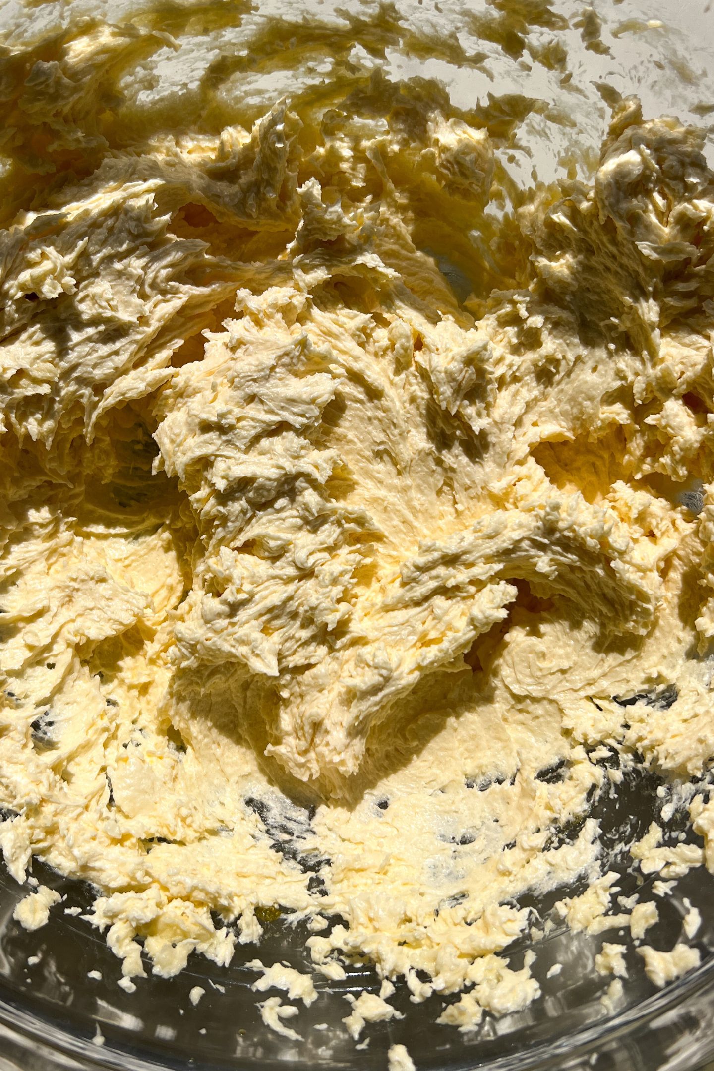 Wet ingredients blended together in a mixing bowl.