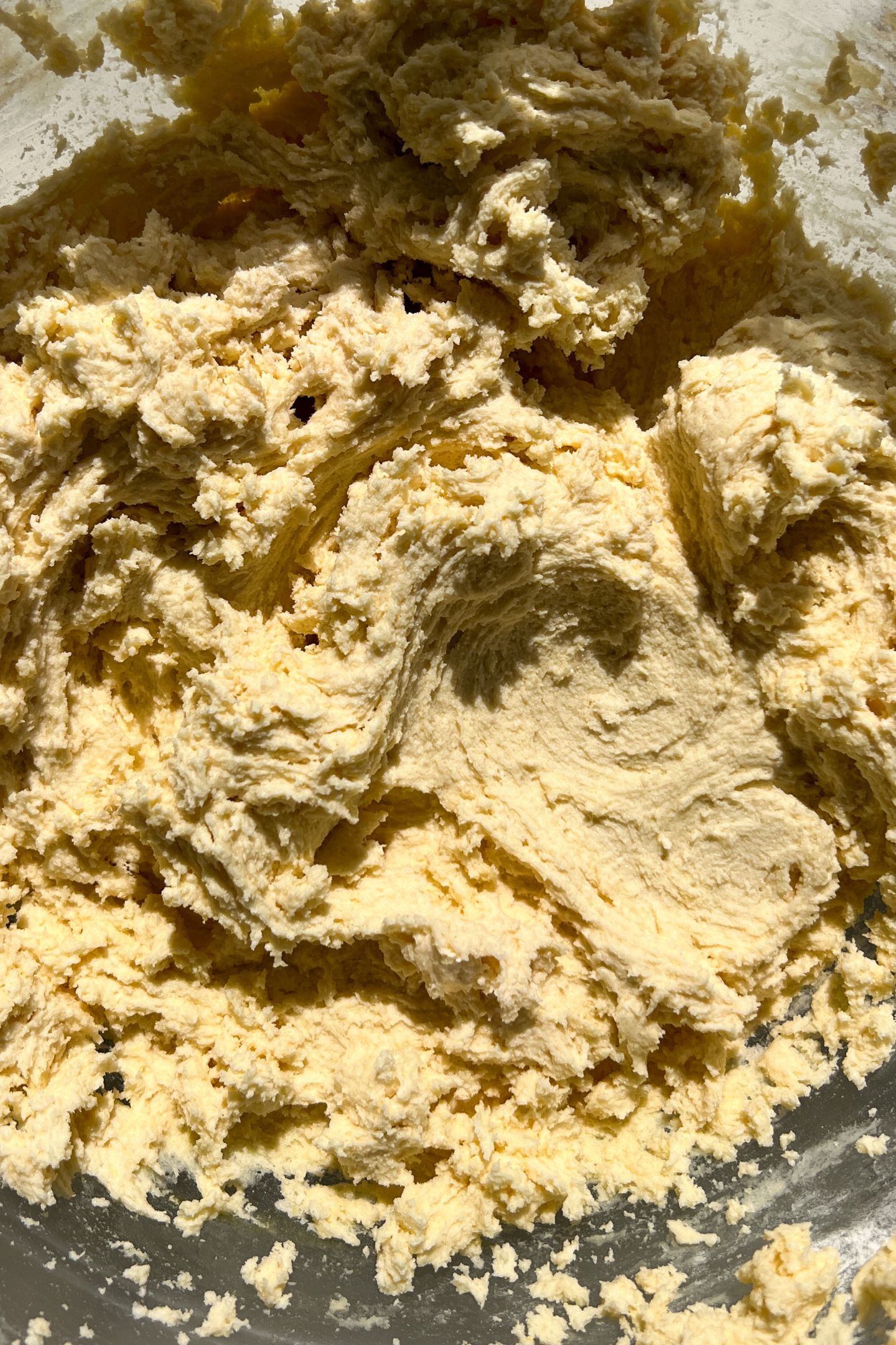 Dough mixed together in a bowl.