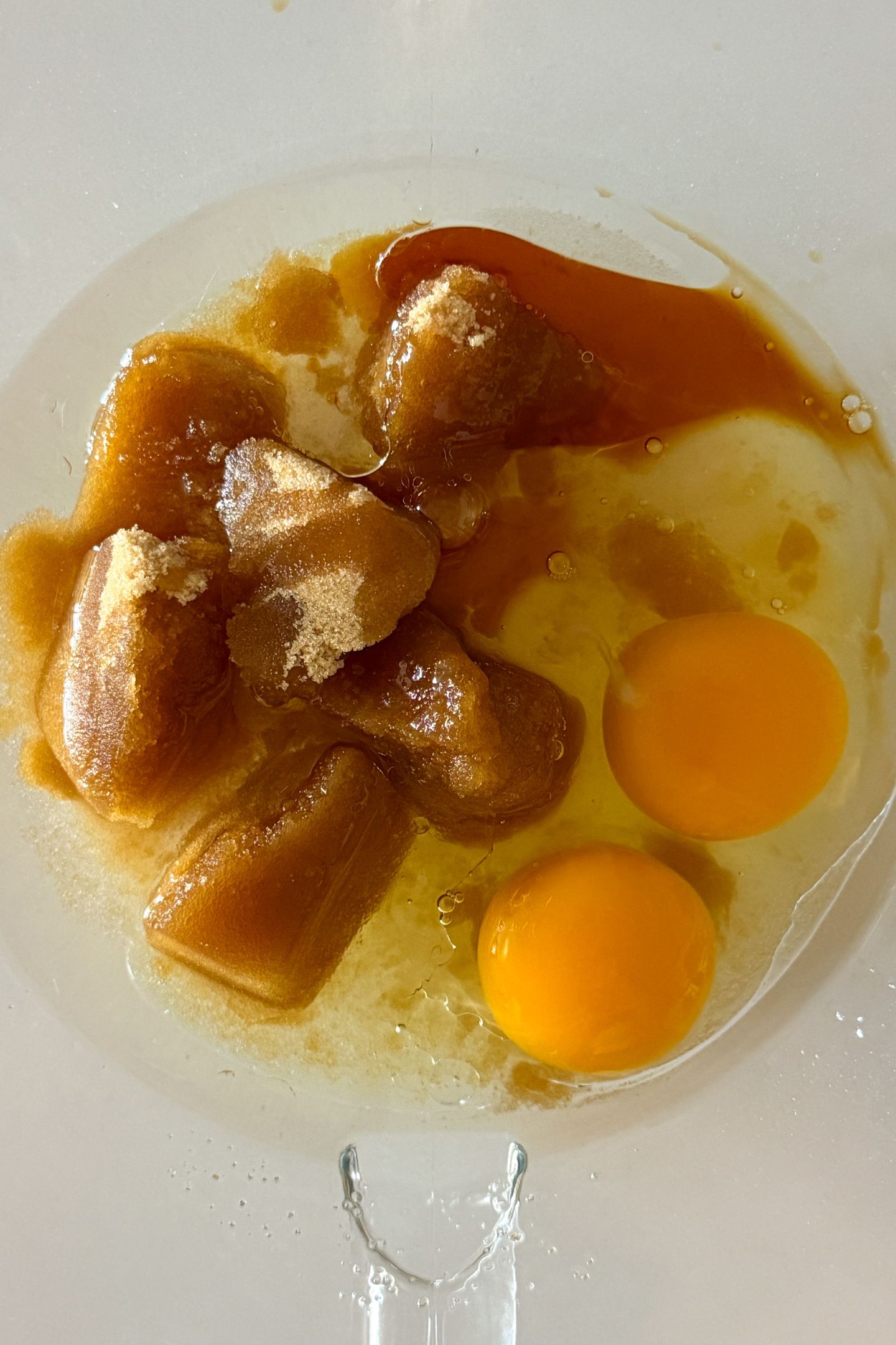 Wet ingredients in a mixing bowl.