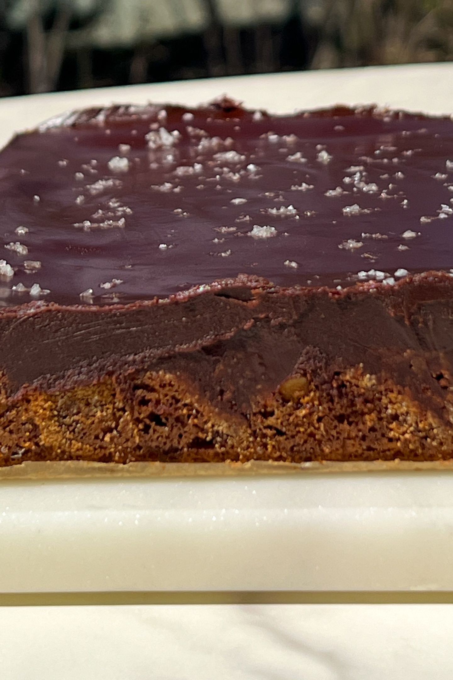 Fully set chocolate ganache on cookie base.