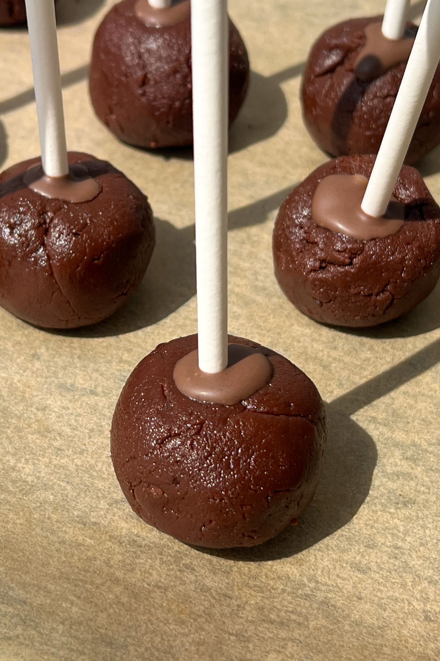 Brownie cake pops on a stick.