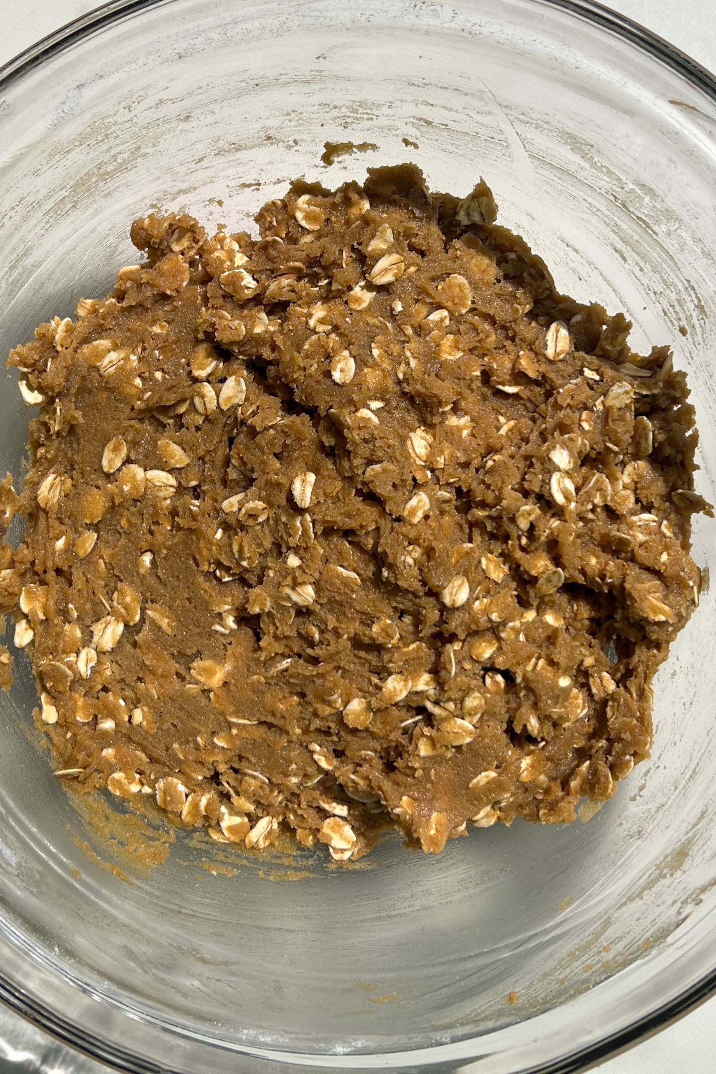Oatmeal cookie base batter in a bowl.