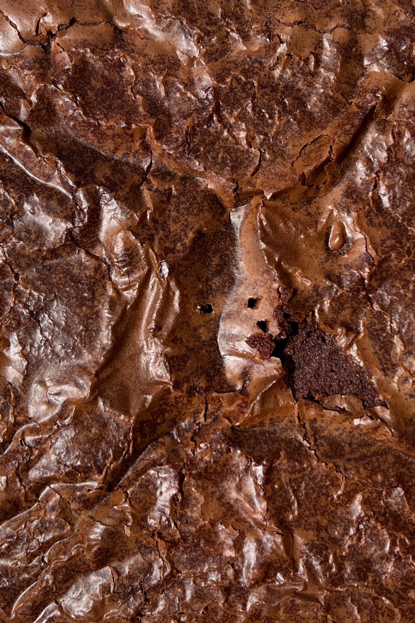 Baked brownie with a crinkly top.