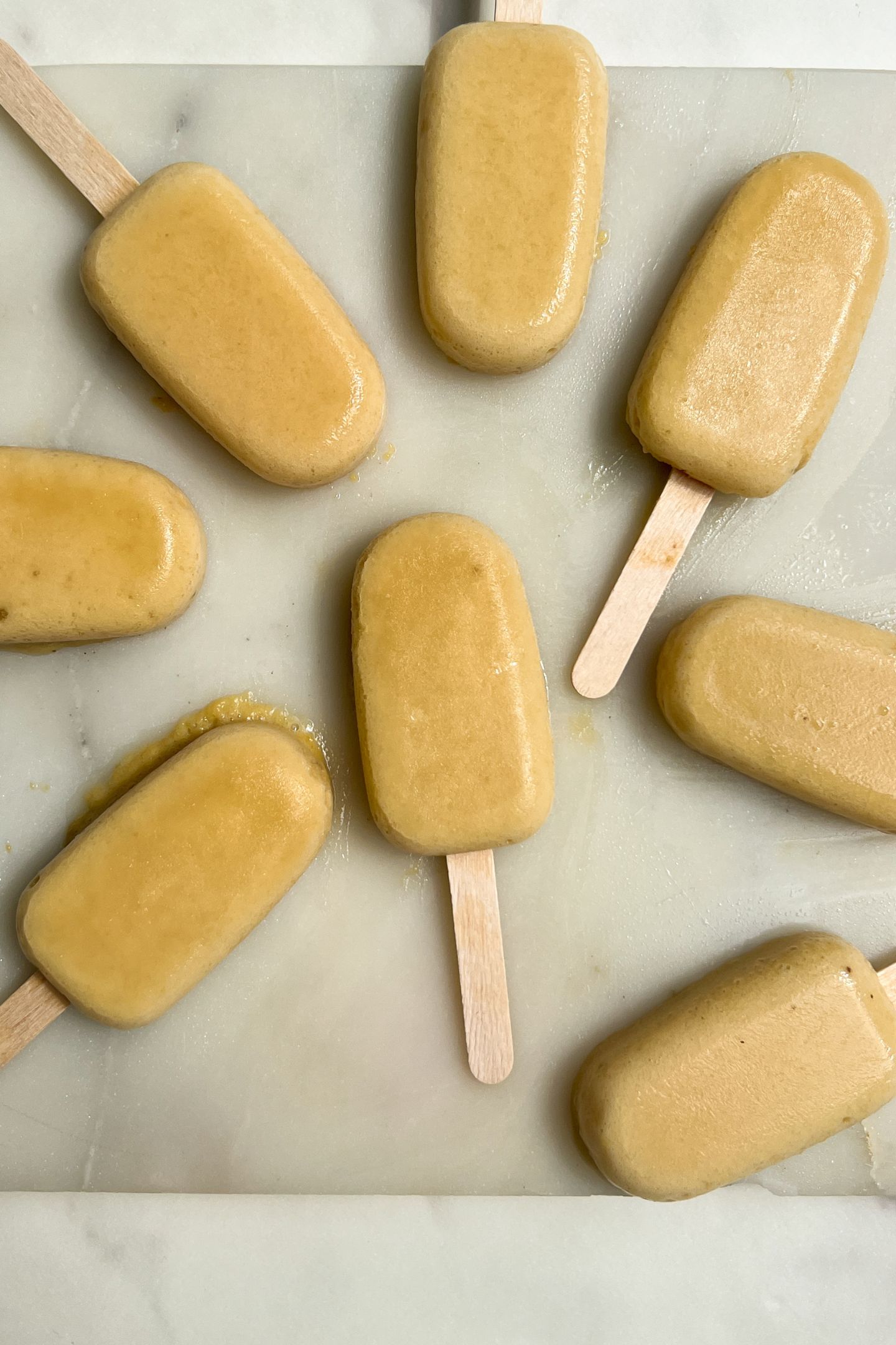 Popsicles ready to eat on a tray.