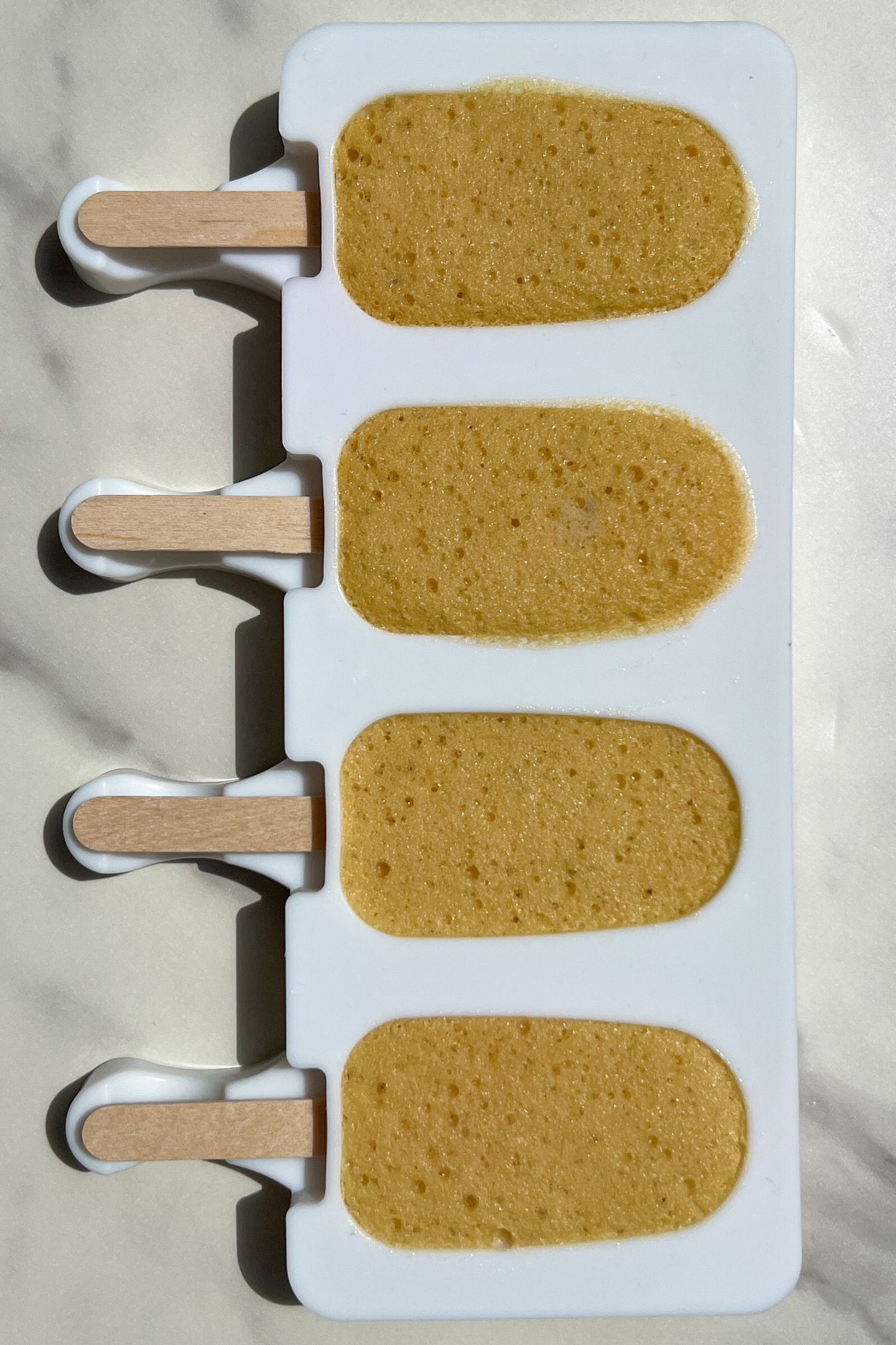Posicle frozen into the molds.
