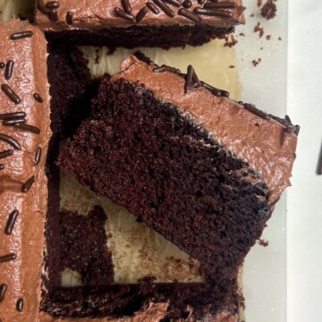 A piece of chocolate cake on its side.