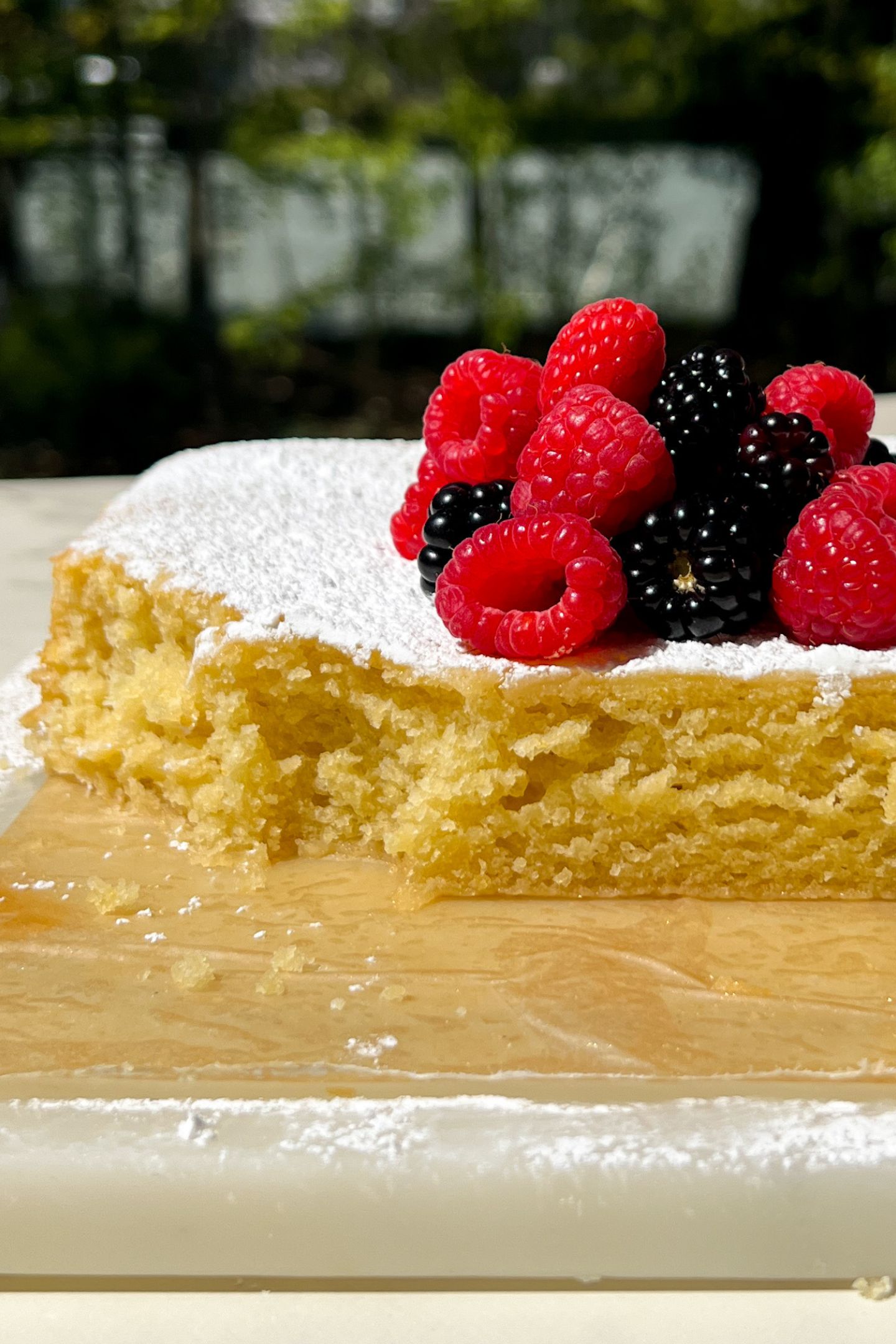 Lemon Olive Oil Cake with pieces taken out.
