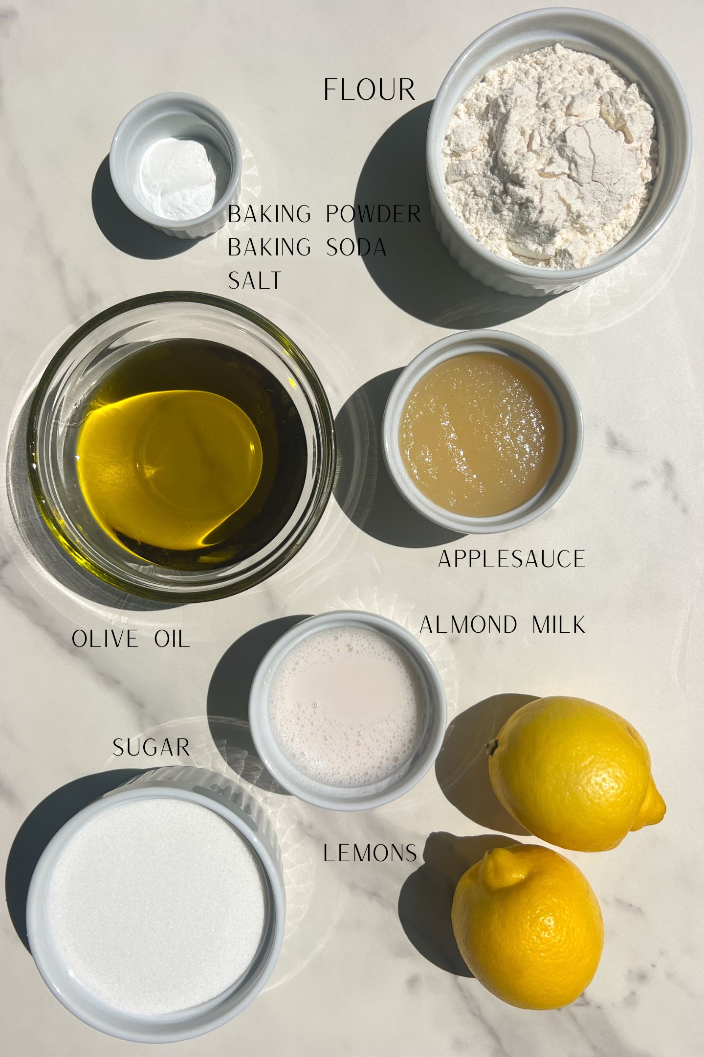 The cake ingredients measured out in bowls.