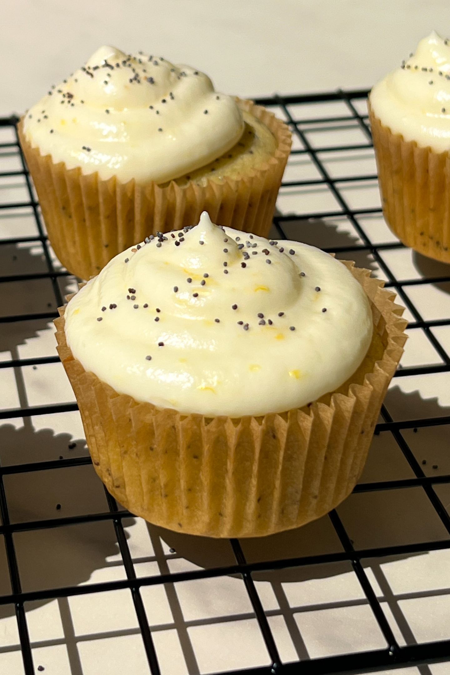 Frosted lemon and poppy seed cupcakes.