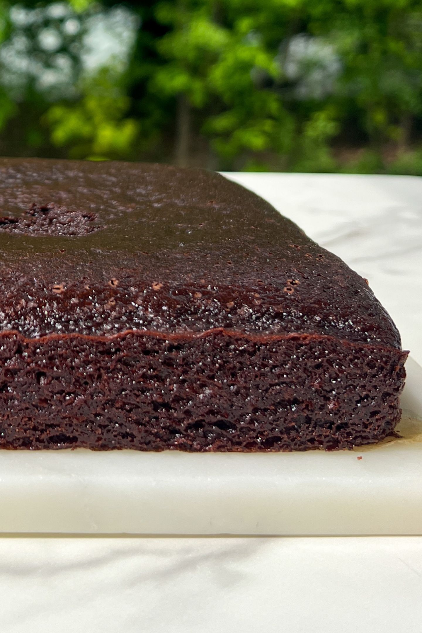 Baked chocolate cake on a platter.