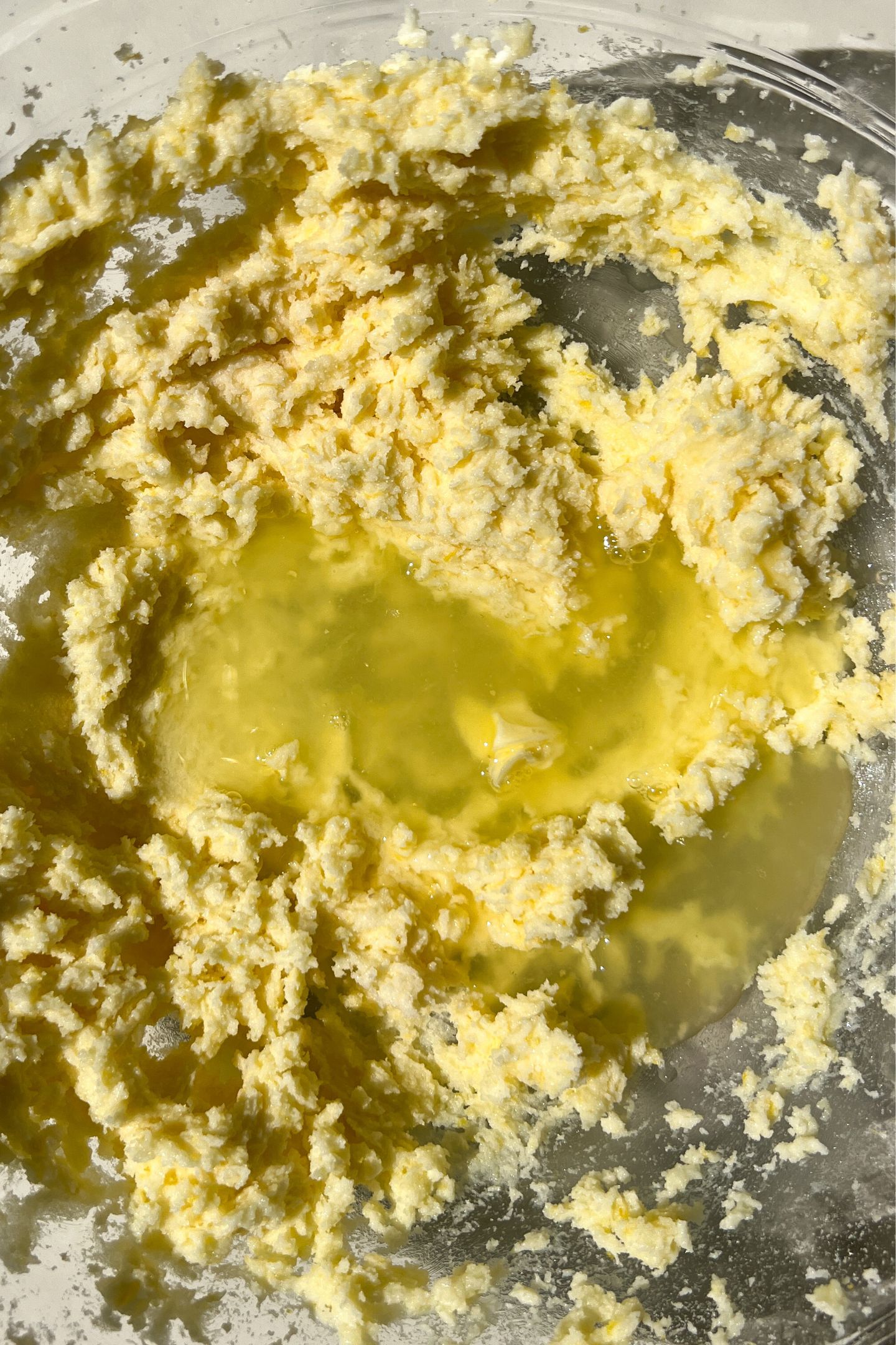 Adding lemon juice to wet ingredients.