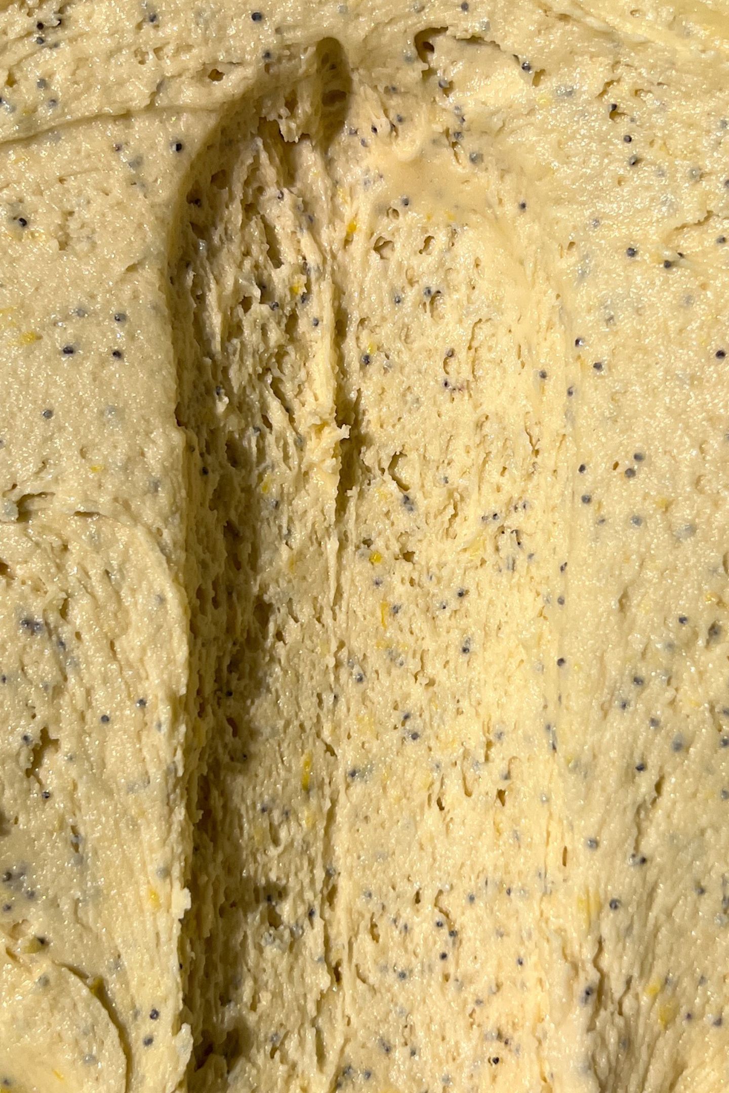 Scooping the cookie batter.