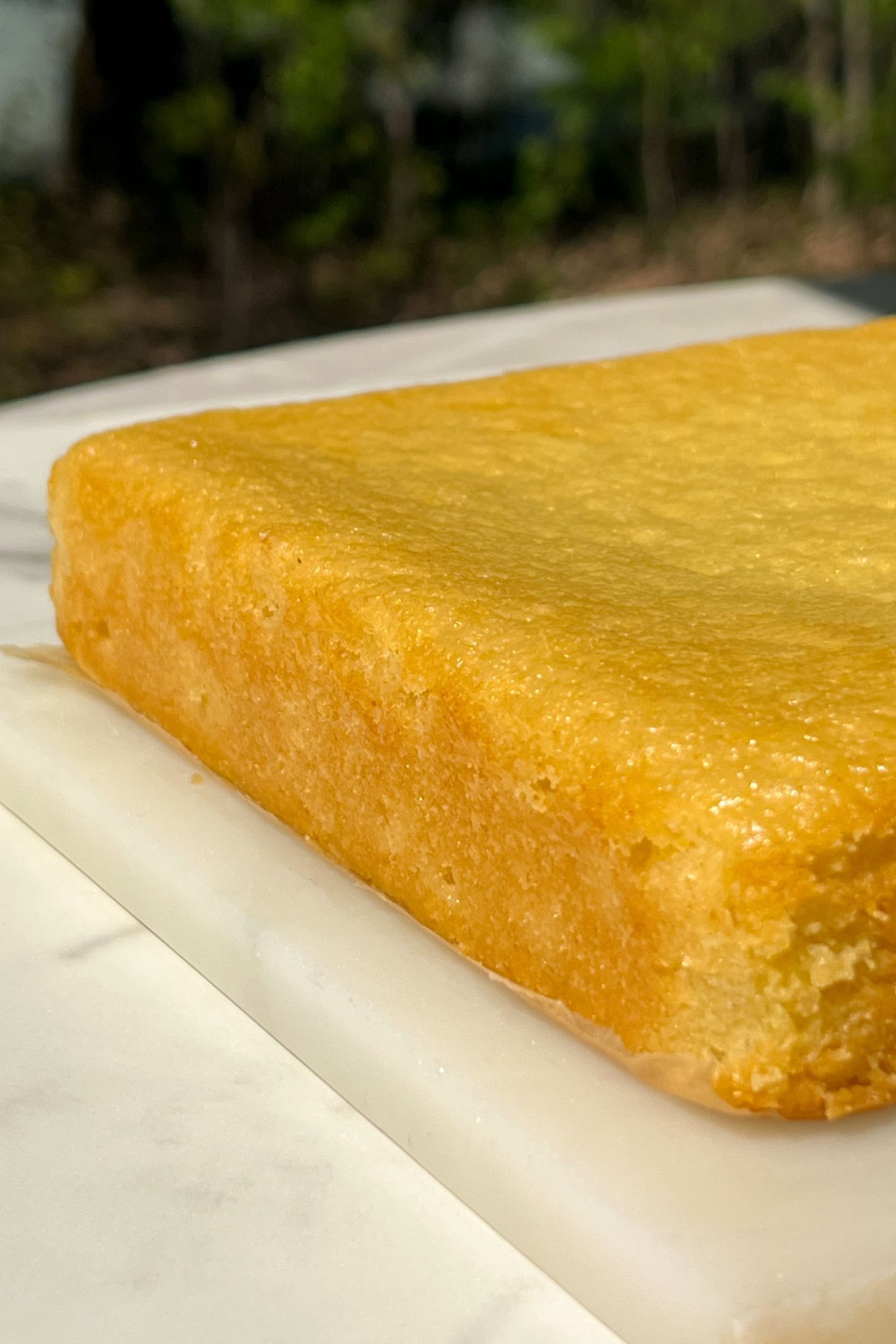 Olive oil cake on a platter.