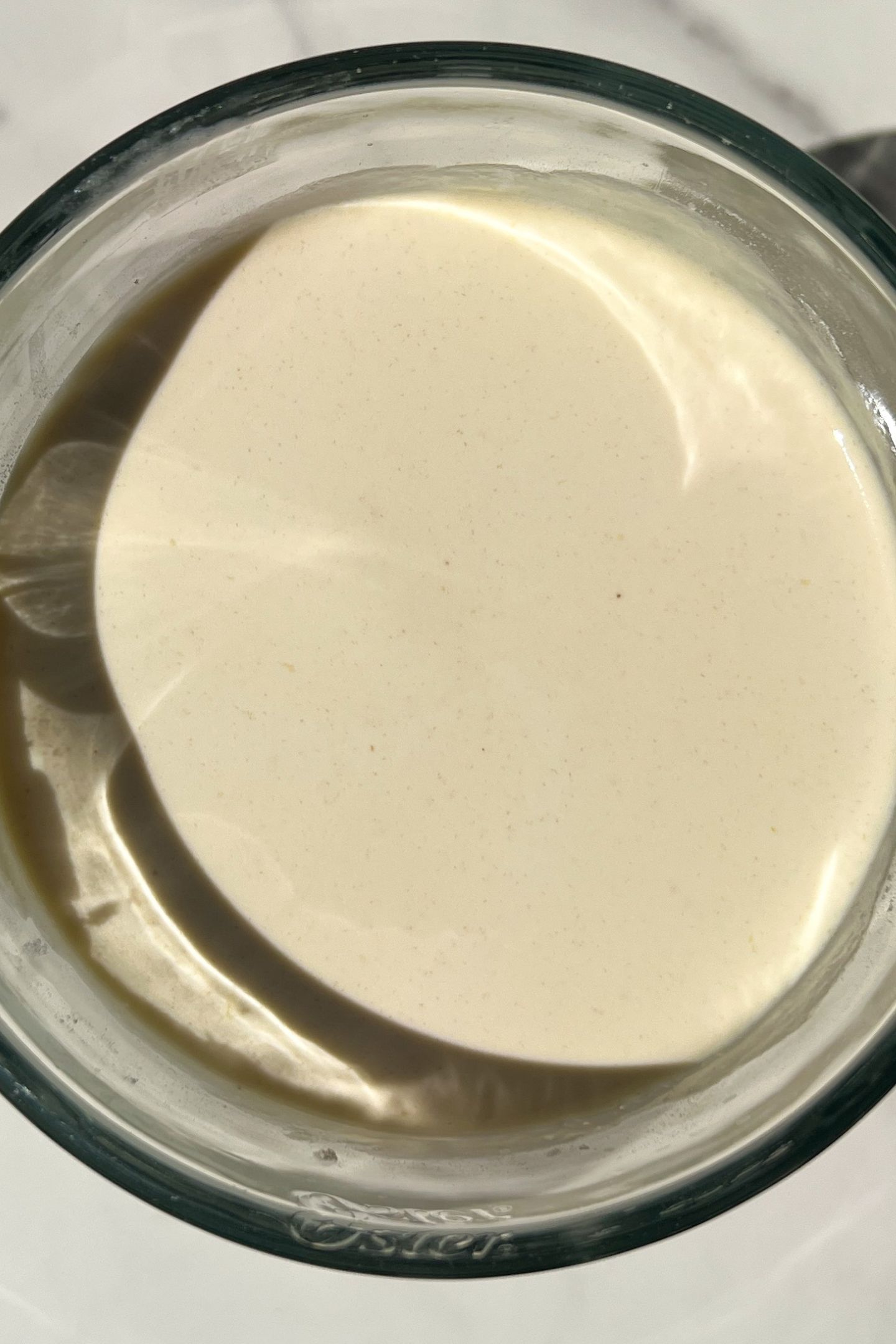 Top down view of smoothie blended in blender.