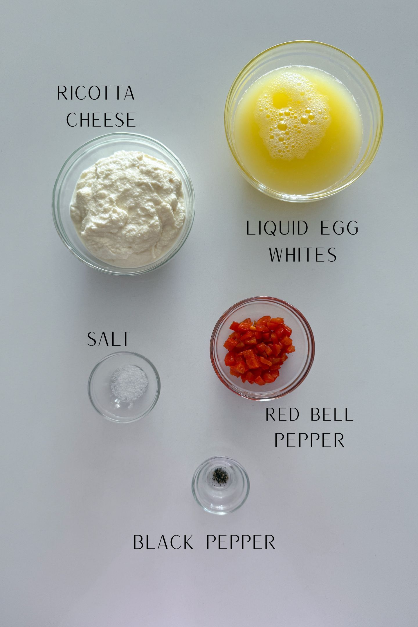 Ingredients measured out in bowls to make the egg white bites.