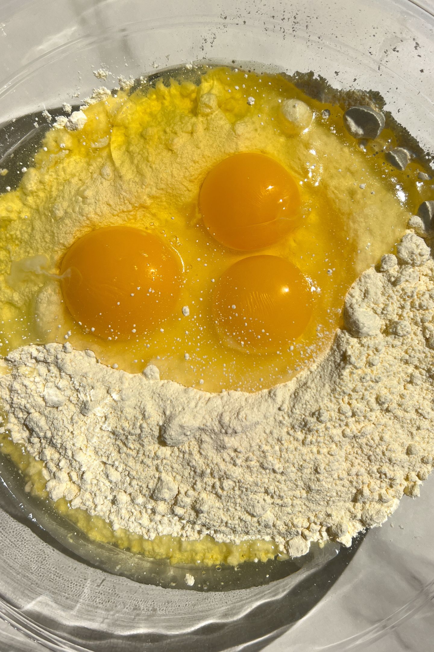 Making cake batter in a bowl.